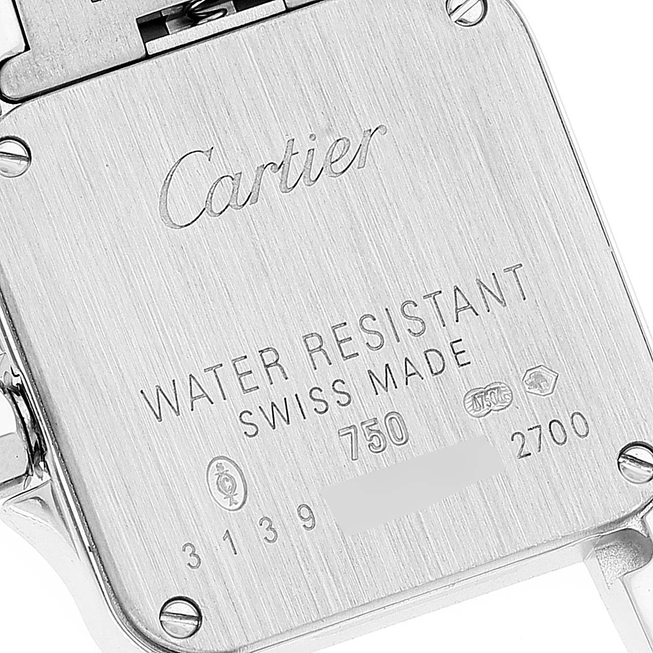 The image shows the back case of a Cartier Santos Demoiselle WF9003Y8 Women
s White Gold Silver Dial WF9003Y8 Women
s White Gold Silver Dial watch, highlighting the engravings.