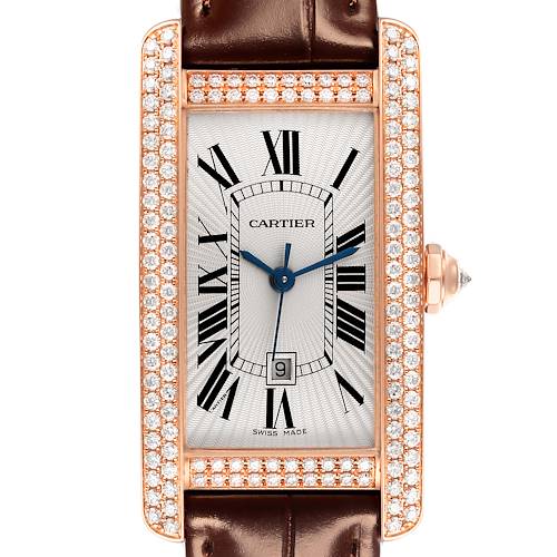 The Cartier Tank Américaine watch is shown from a top view, highlighting the face, bezel with diamonds, and part of the leather strap.