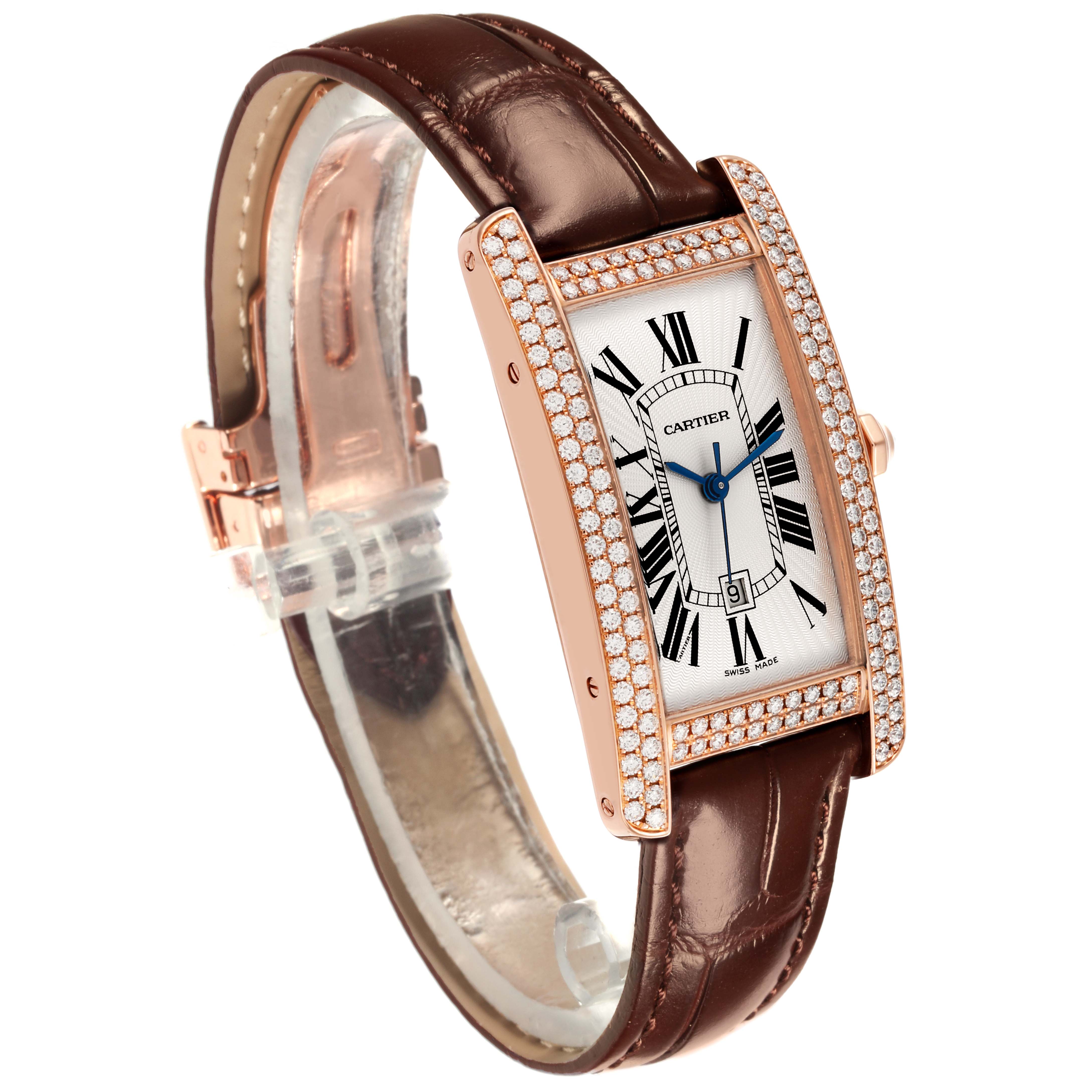 The Cartier Tank Americaine WB704751 Women's Rose Gold Silver Dial WB704751 Women's Rose Gold Silver Dial watch is shown at an angled view with a clear display of the face, bezel, and leather strap.