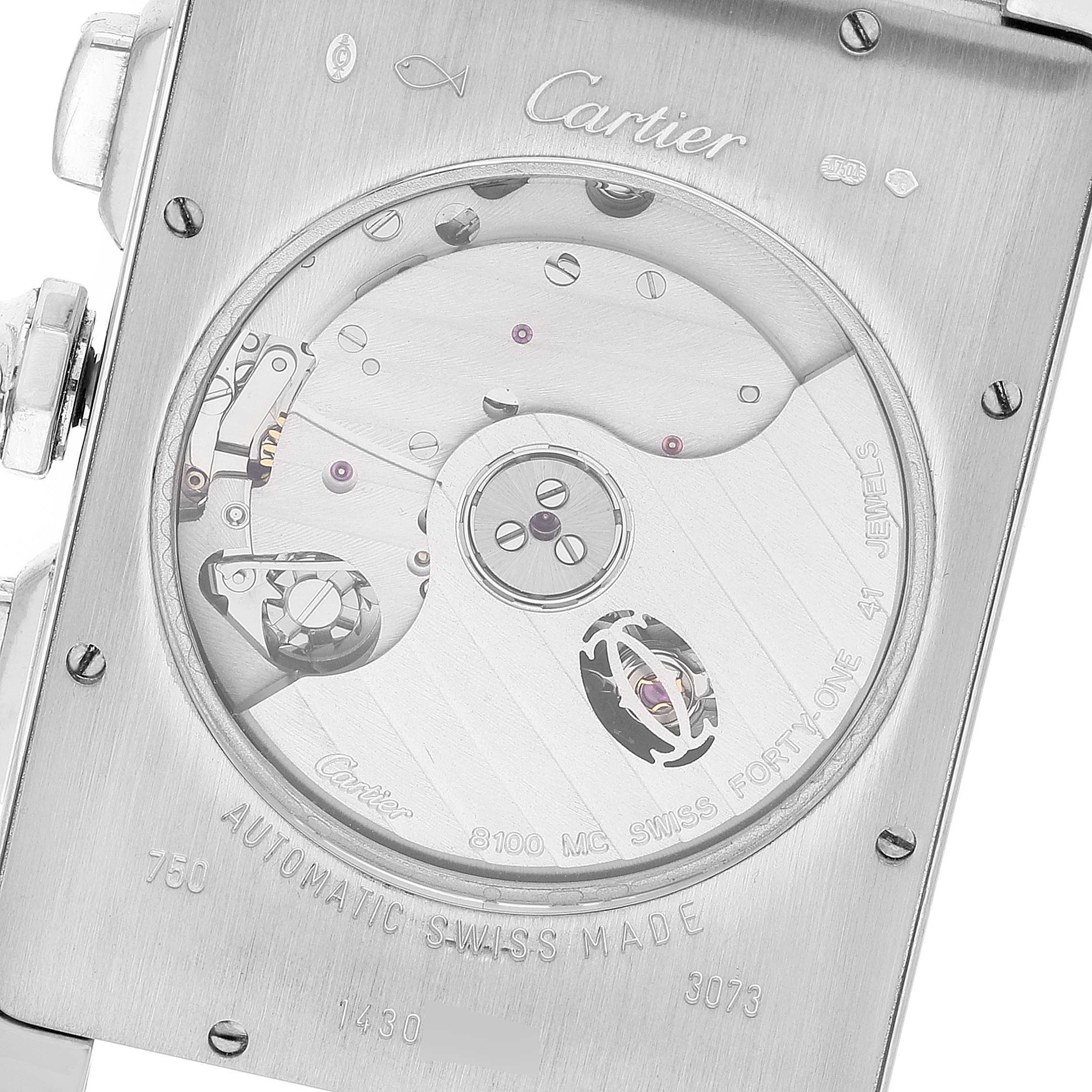 The image shows the back of a Cartier Tank Americaine W2609456 Men's White Gold Silver Dial W2609456 Men's White Gold Silver Dial watch, highlighting the movement mechanics and detailed engravings.