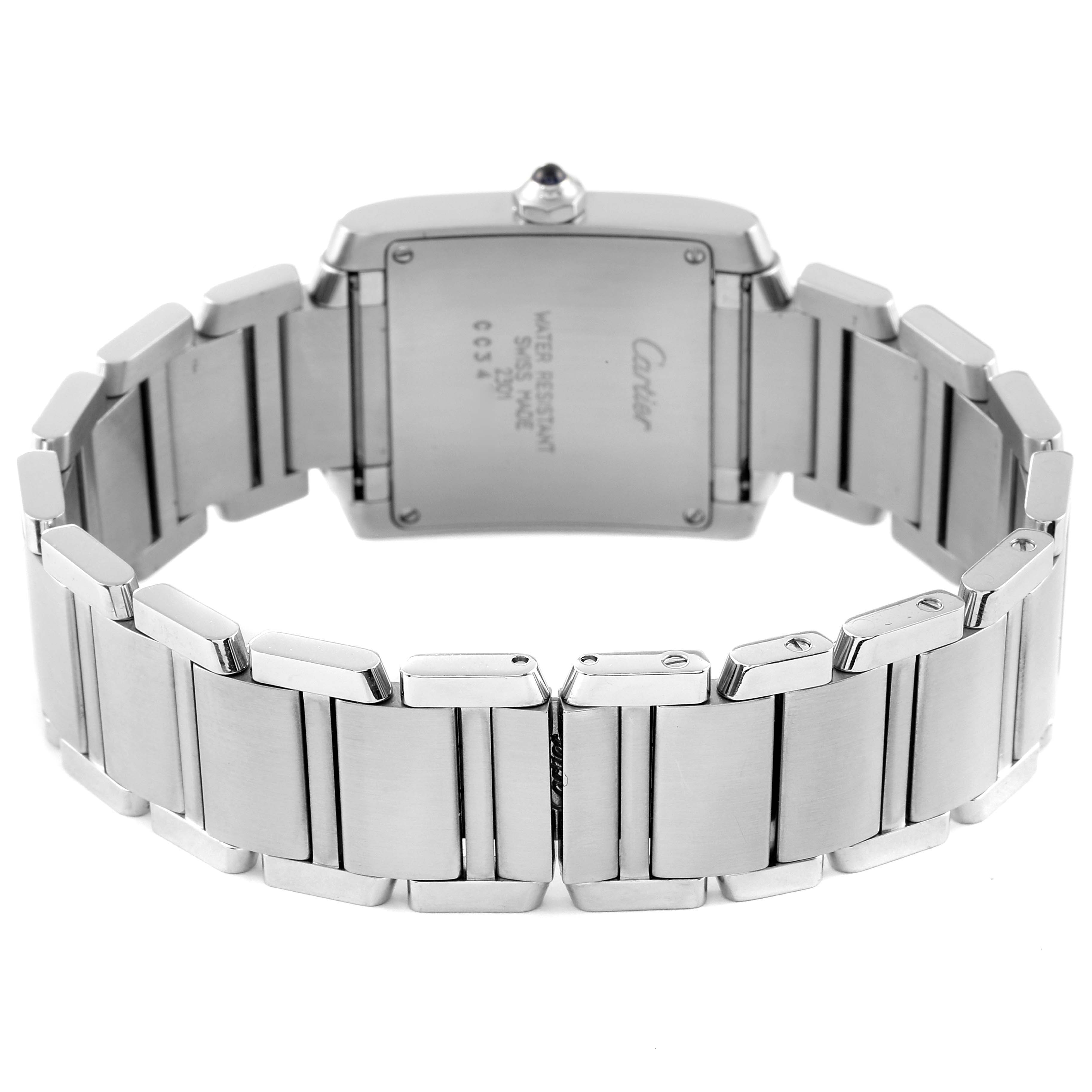 The image shows the back of a Cartier Tank Francaise W51003Q3 Women's Stainless Steel Silver Dial W51003Q3 Women's Stainless Steel Silver Dial watch with a focus on the case and metal bracelet.