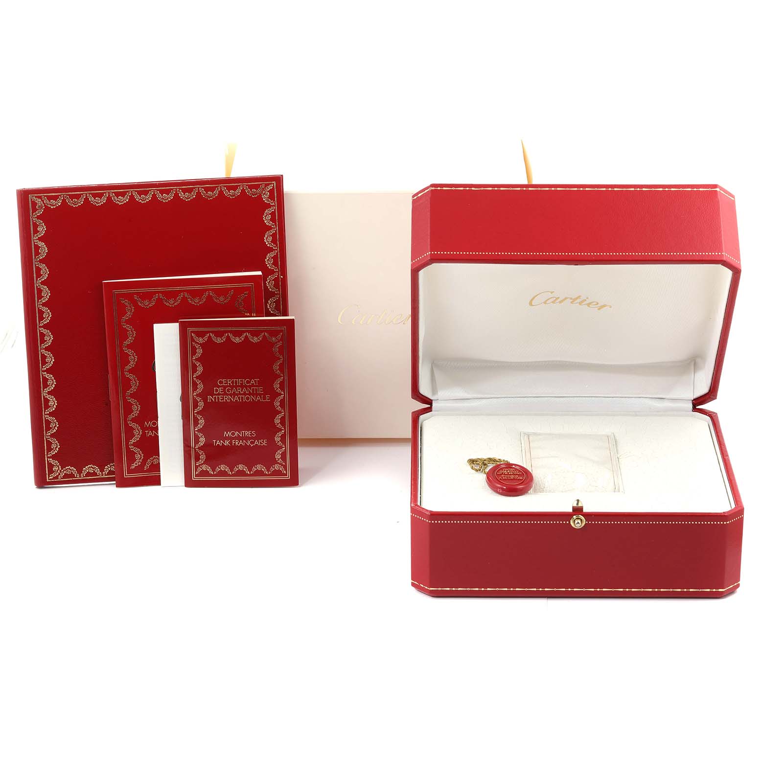 The image shows the packaging, manuals, and warranty card for the Cartier Tank Francaise W51003Q3 Women's Stainless Steel Silver Dial W51003Q3 Women's Stainless Steel Silver Dial model watch.