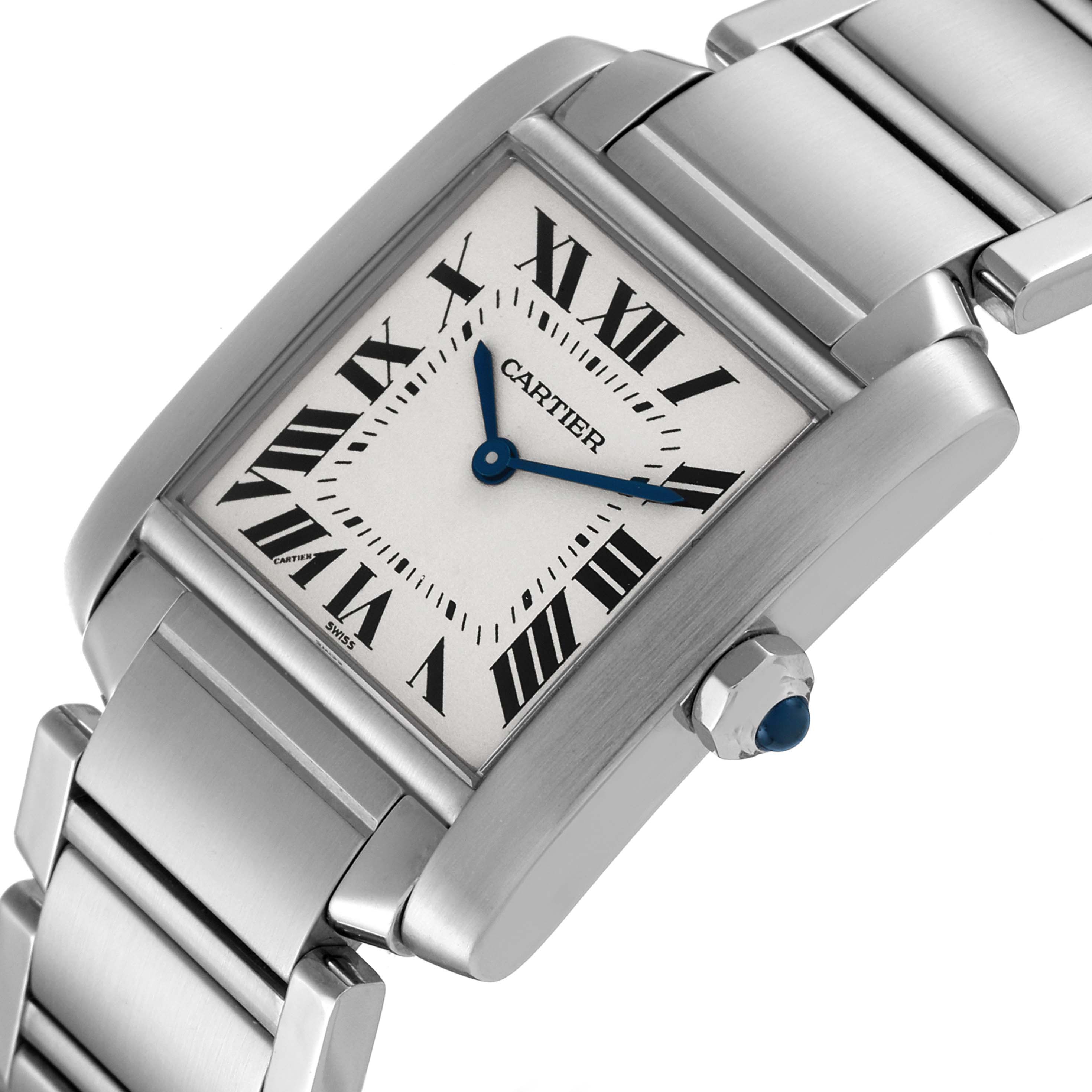 The image shows a Cartier Tank Française watch from an angled view, highlighting the face, crown, and metal band.