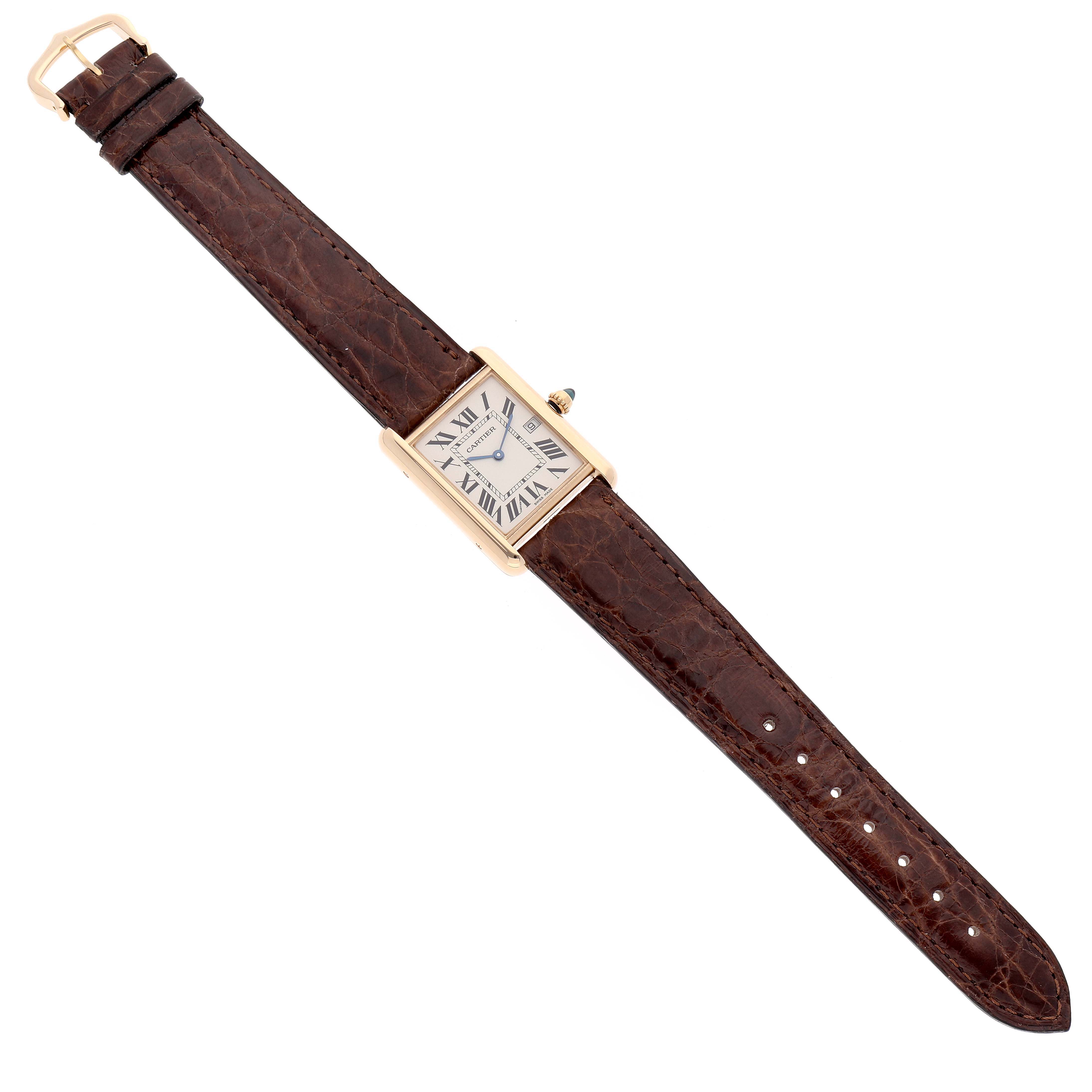 This image shows a Tank Louis model by Cartier, displaying the watch face and strap from a top-down angle.