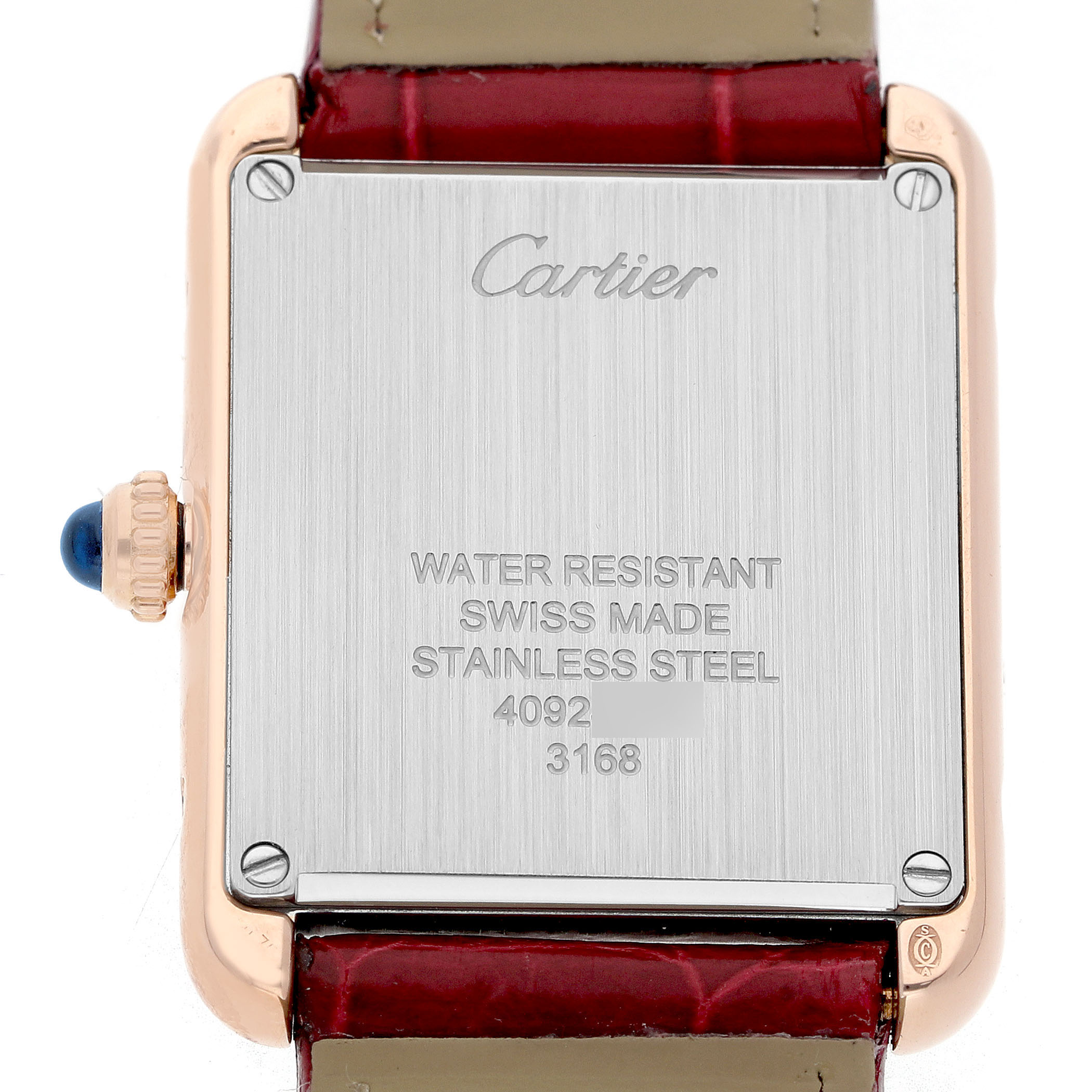 The image shows the back of a Cartier Tank Solo W5200024 Women's Steel and Gold (two tone) Silver Dial watch, highlighting the stainless steel case and red leather strap.