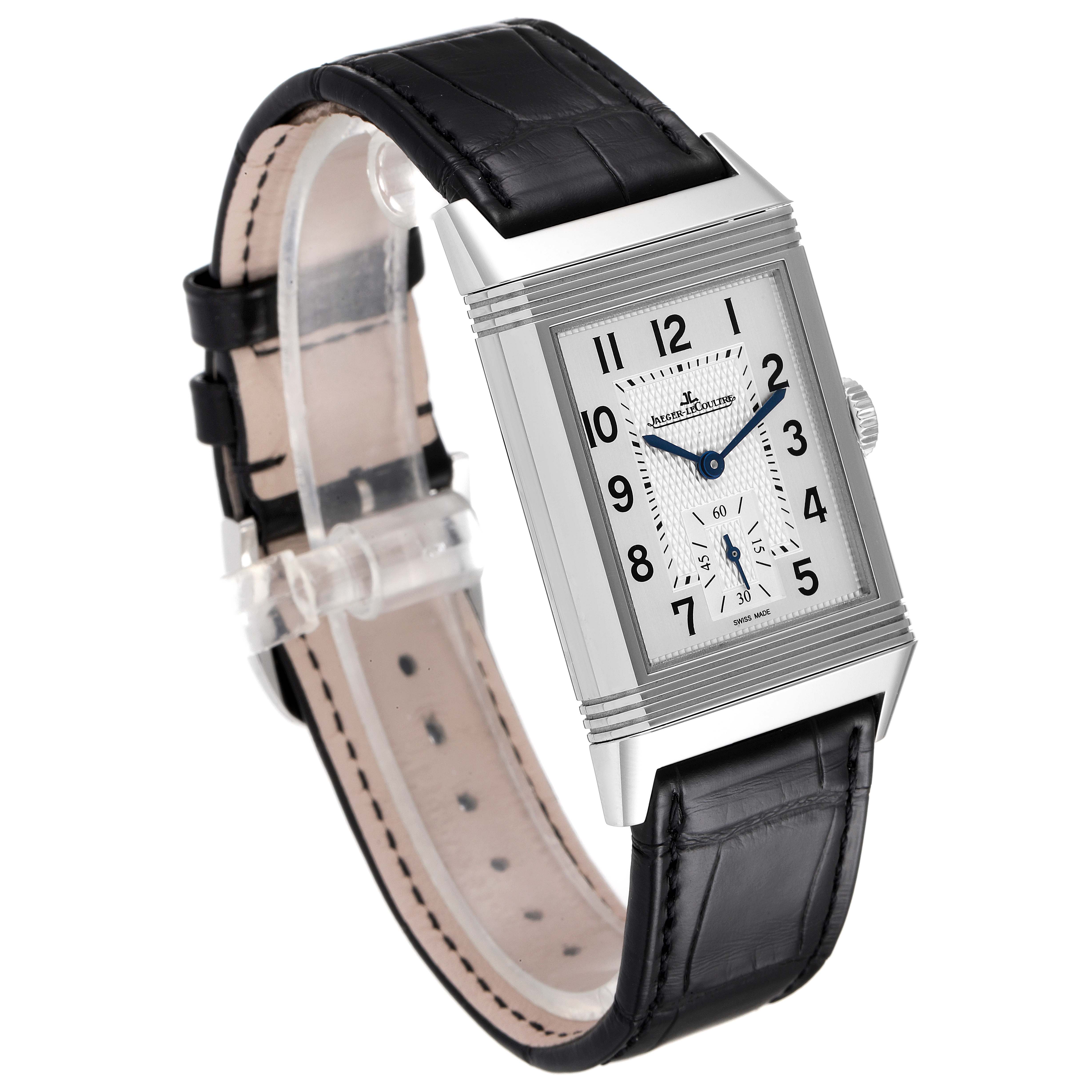 The Jaeger-LeCoultre Reverso watch displays a front angle, showing the rectangular face, strap, crown, and clasp.