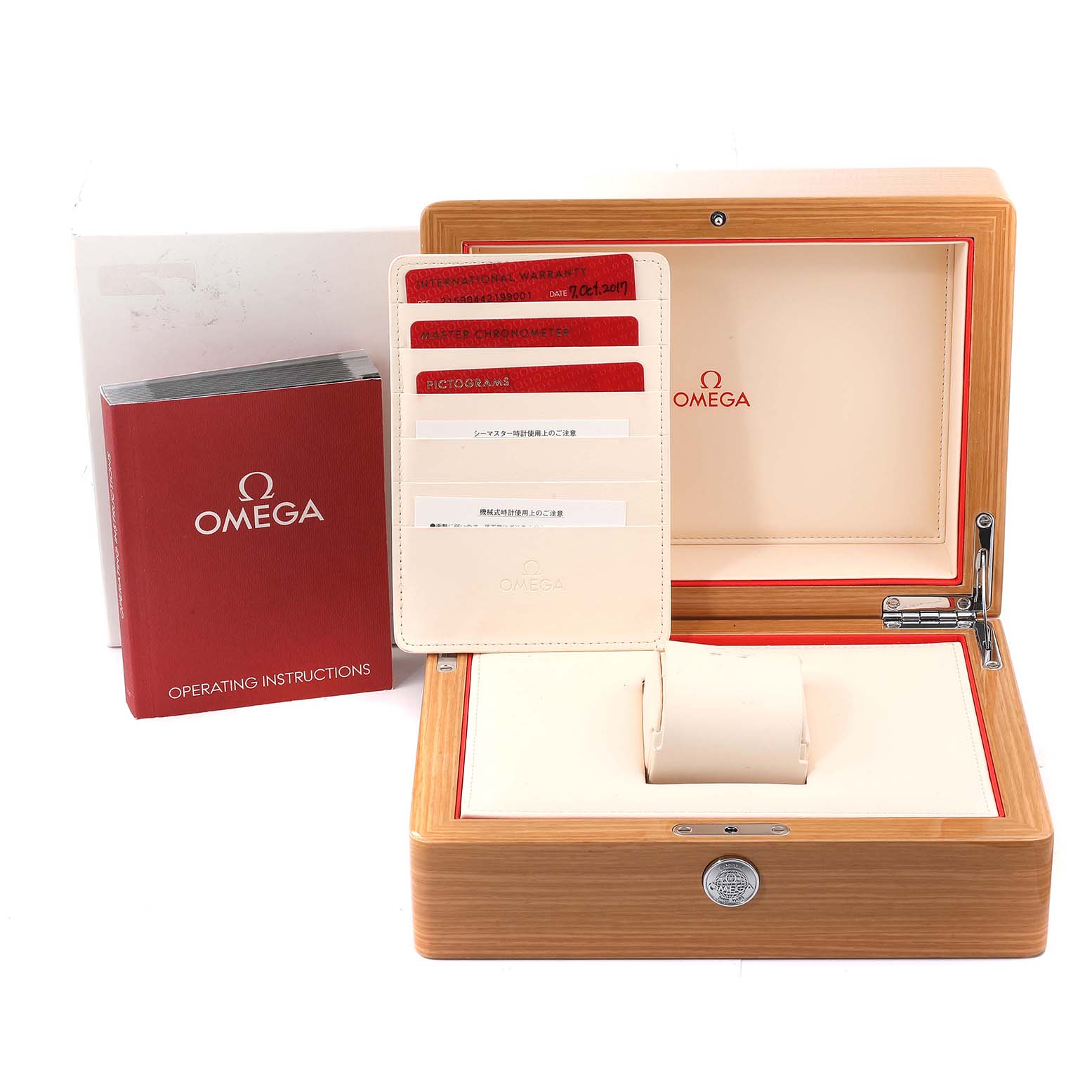 This image shows the packaging and accessories for the Omega Planet Ocean 215.90.44.21.99.001 Men's Titanium Grey Dial 215.90.44.21.99.001 Men's Titanium Grey Dial model, including the box, instruction manual, and warranty cards.