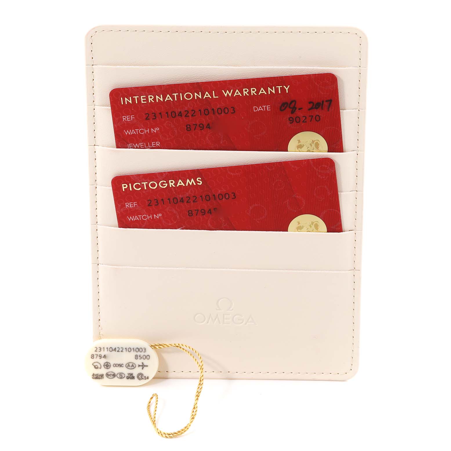 The image shows warranty and pictogram cards along with a tag for the Omega Aqua Terra 231.10.42.21.01.003 Men's Stainless Steel Black Dial 231.10.42.21.01.003 Men's Stainless Steel Black Dial model in a white cardholder.