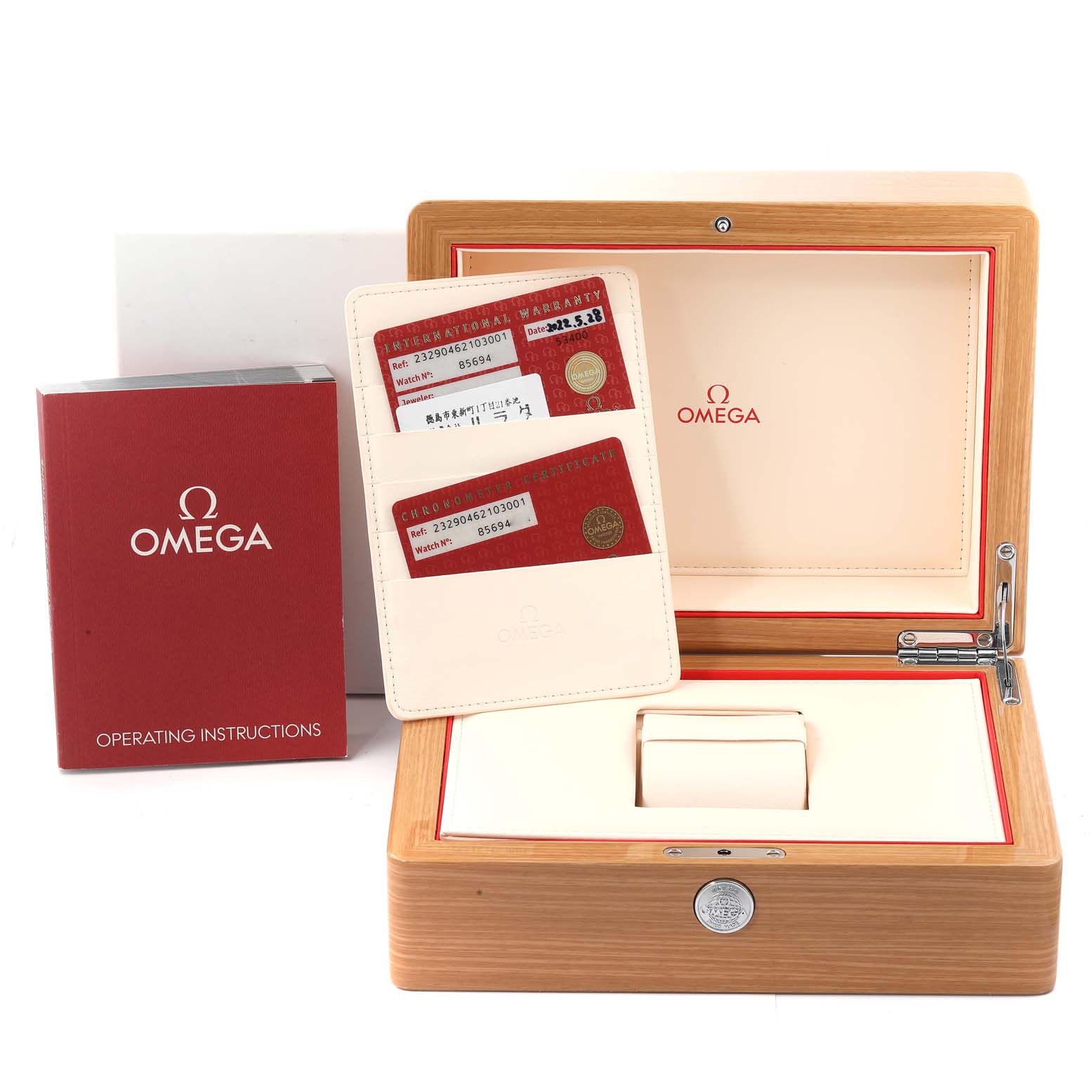 The image shows the Omega Planet Ocean 232.90.46.21.03.001 Men's Titanium Blue Dial 232.90.46.21.03.001 Men's Titanium Blue Dial watch packaging, including the watch box, warranty cards, and operating instructions.