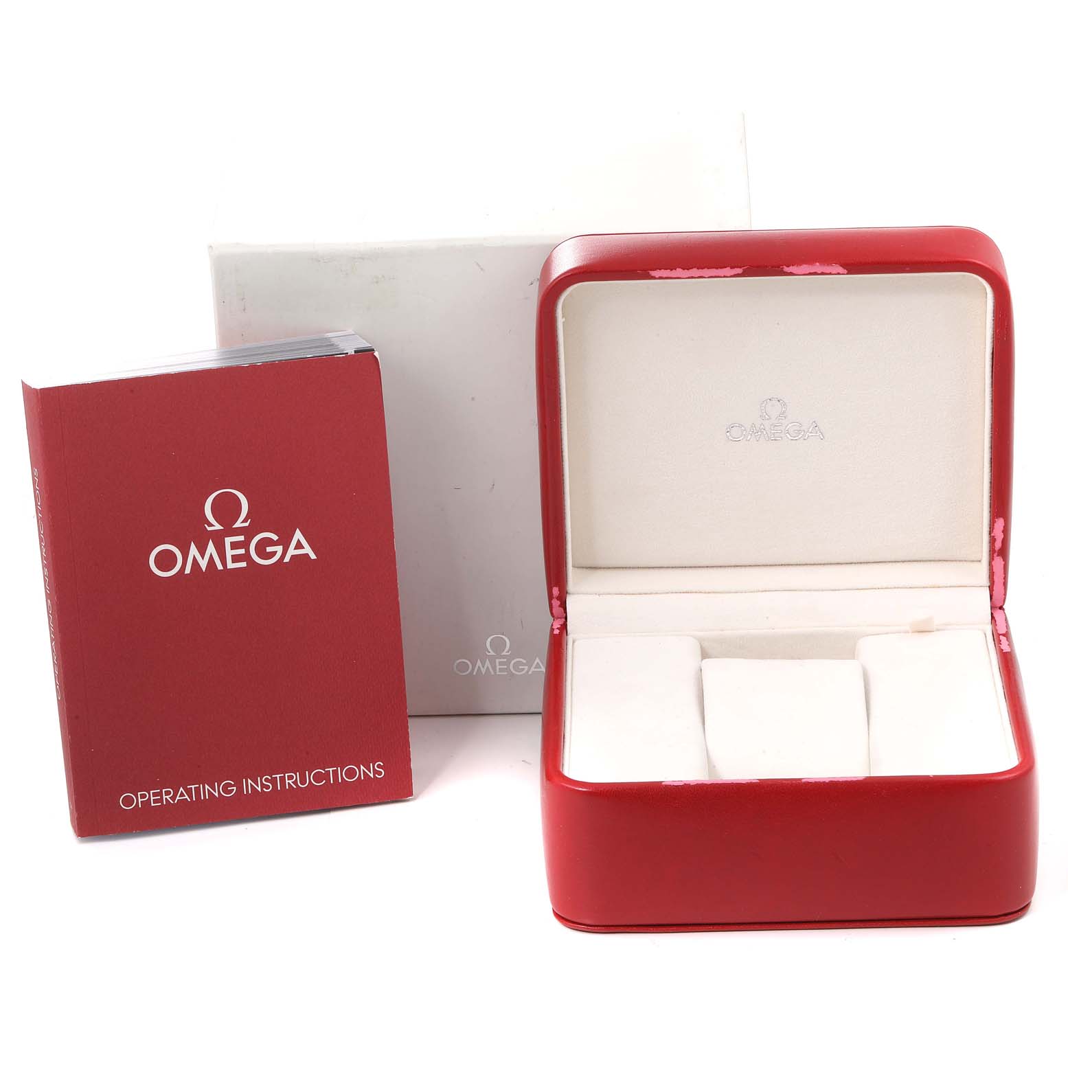 The image shows an Omega Speedmaster 3210.52.00 Men
s Stainless Steel Black Dial 3210.52.00 Men
s Stainless Steel Black Dial watch box, an operating instructions booklet, and an outer cardboard box, all from a front angle.