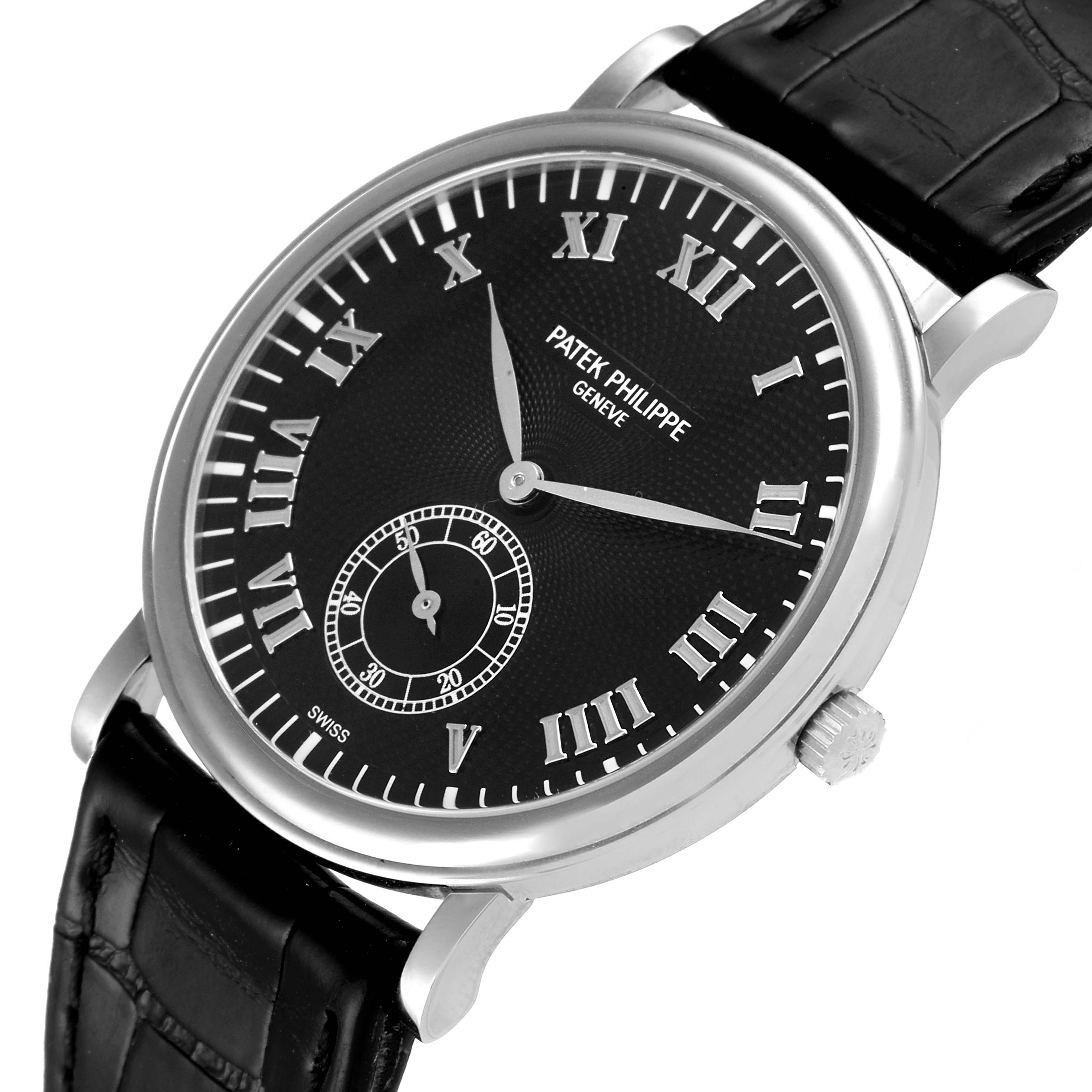 The image shows a Patek Philippe Calatrava 5022G Men's White Gold Black Dial 5022G Men's White Gold Black Dial watch at a slight angle, displaying its black dial, Roman numerals, subdial, and black leather strap.