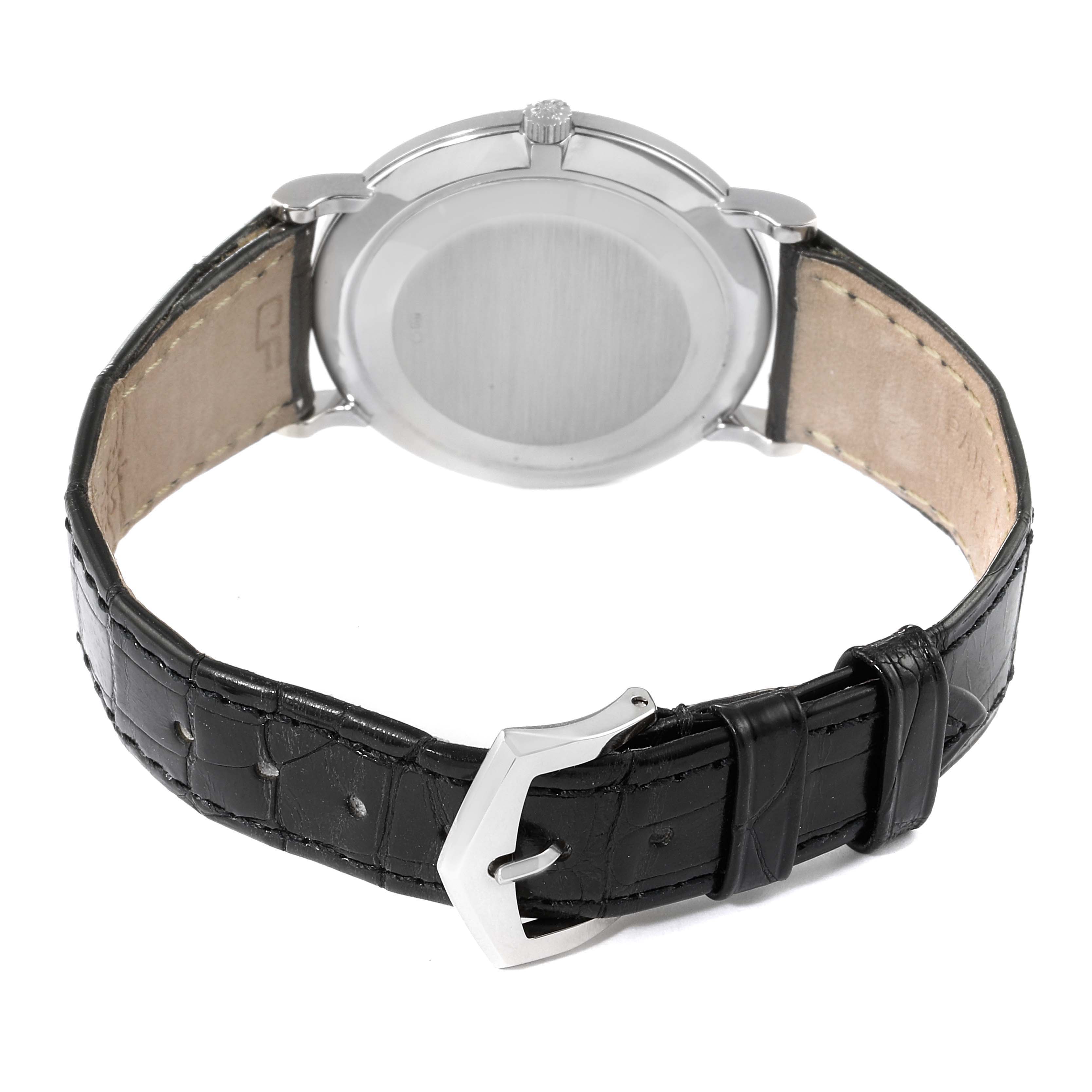 The image shows the back view and strap of a Patek Philippe Calatrava 5022G Men's White Gold Black Dial 5022G Men's White Gold Black Dial watch, highlighting its buckle and case back.