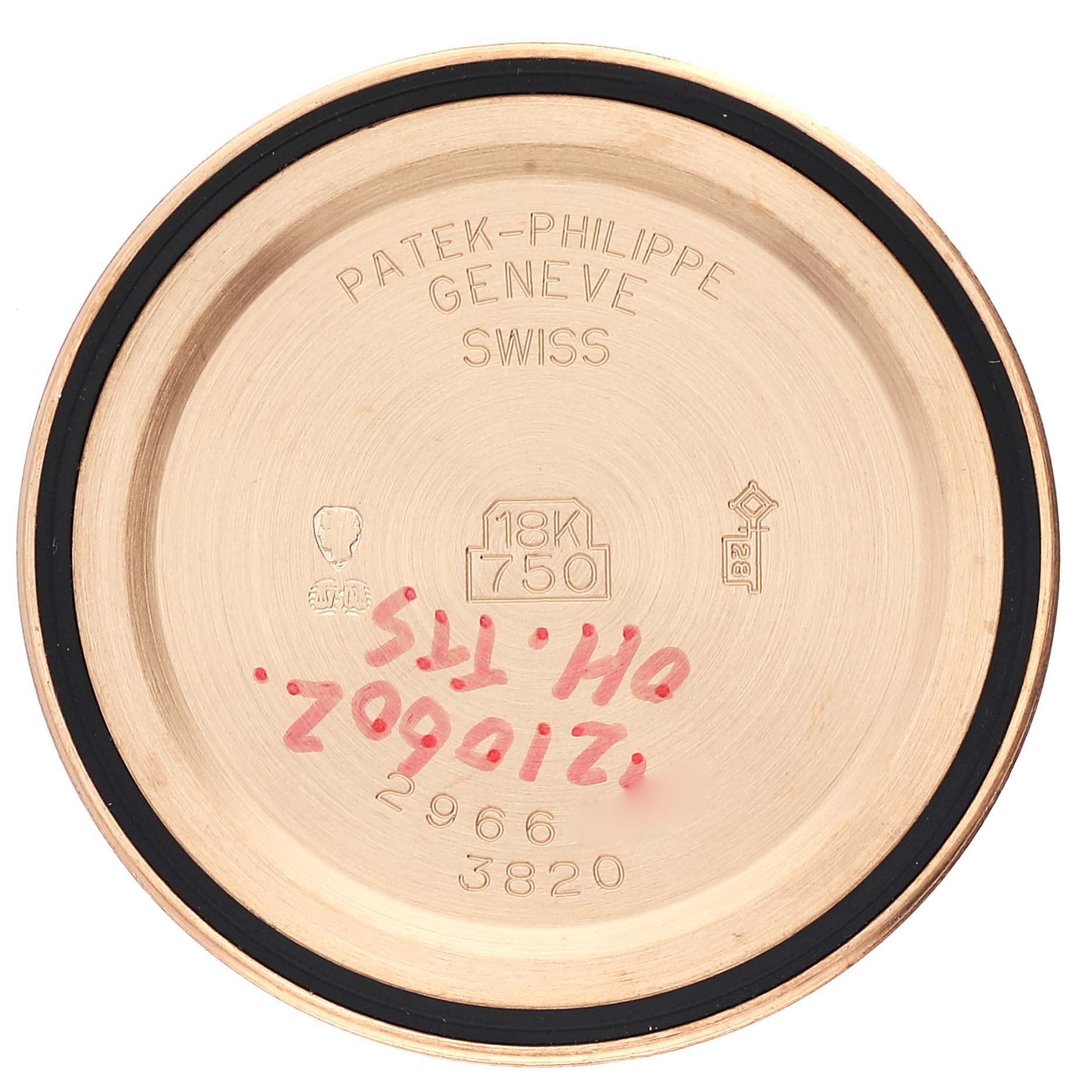 This image shows the inside case back of a Vintage Patek Philippe watch model 3820, marked with various inscriptions and hallmarks.