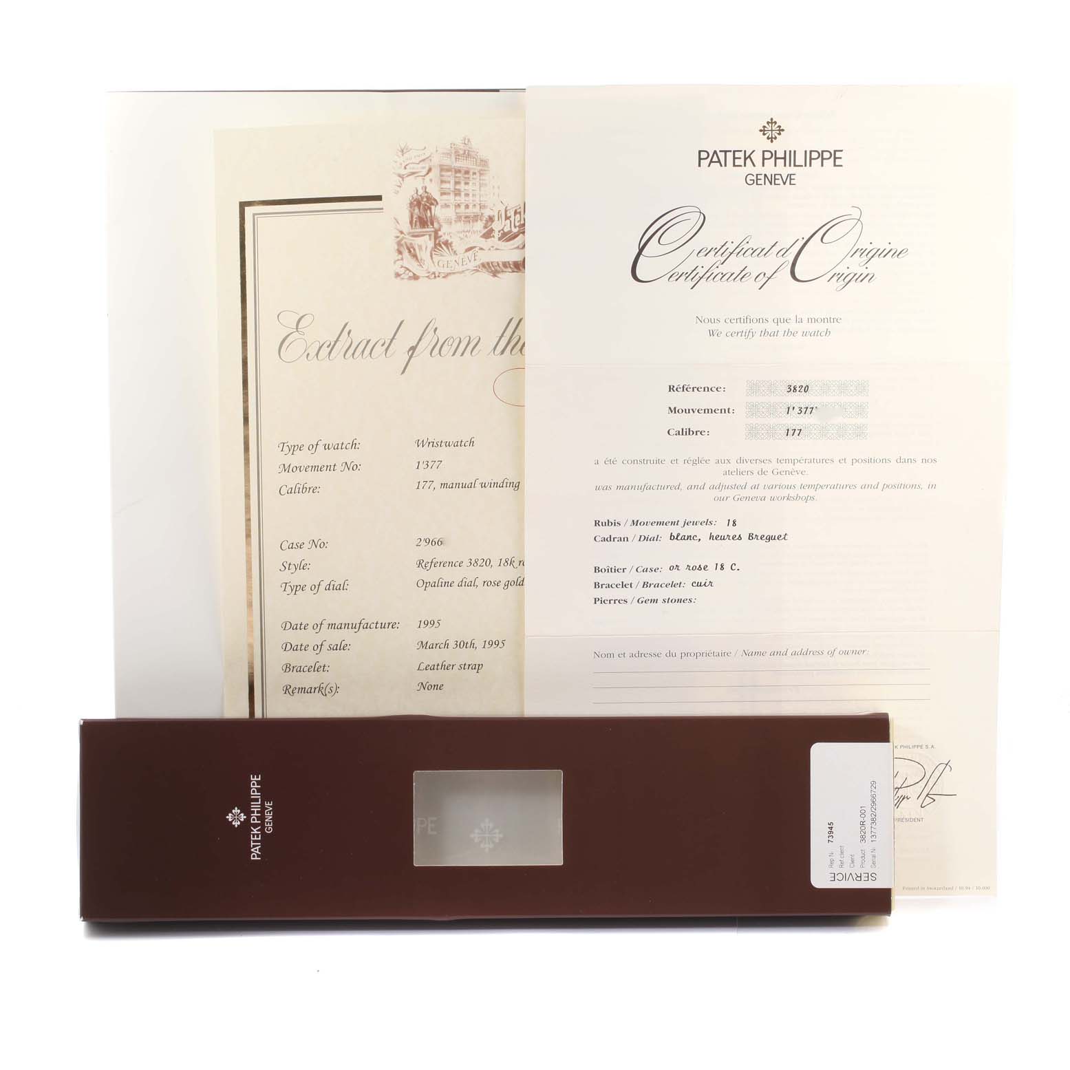 The image shows documents and a case for a Vintage model Patek Philippe watch, including a certificate of origin.