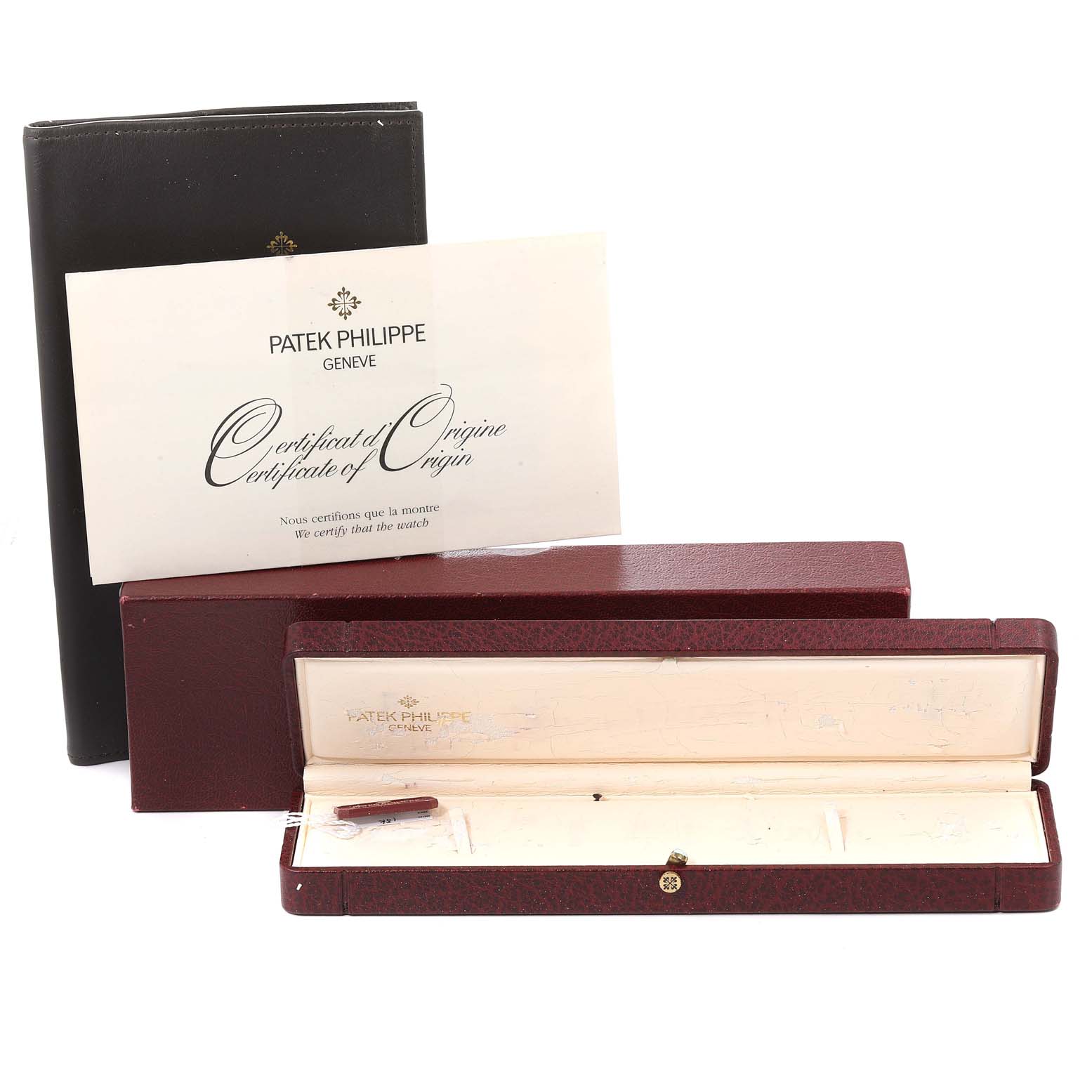 The image shows the packaging, certificate, and empty case for the Patek Philippe Gondolo 5024J Men
s Yellow Gold Silver Dial 5024J Men
s Yellow Gold Silver Dial watch.