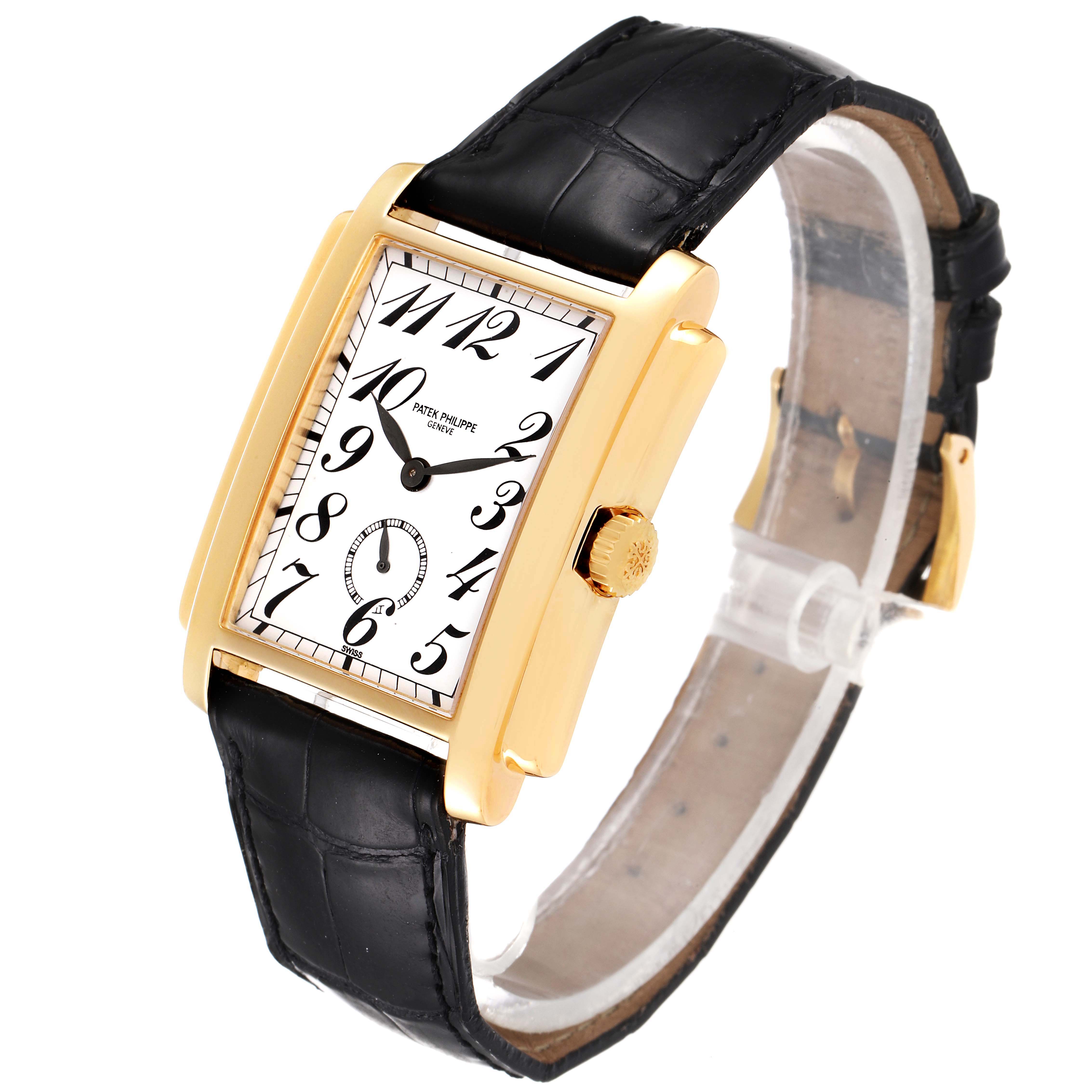 The image shows a Patek Philippe Gondolo 5024J Men
s Yellow Gold Silver Dial 5024J Men
s Yellow Gold Silver Dial watch at a three-quarter angle, highlighting its gold case, white dial, and black leather strap.