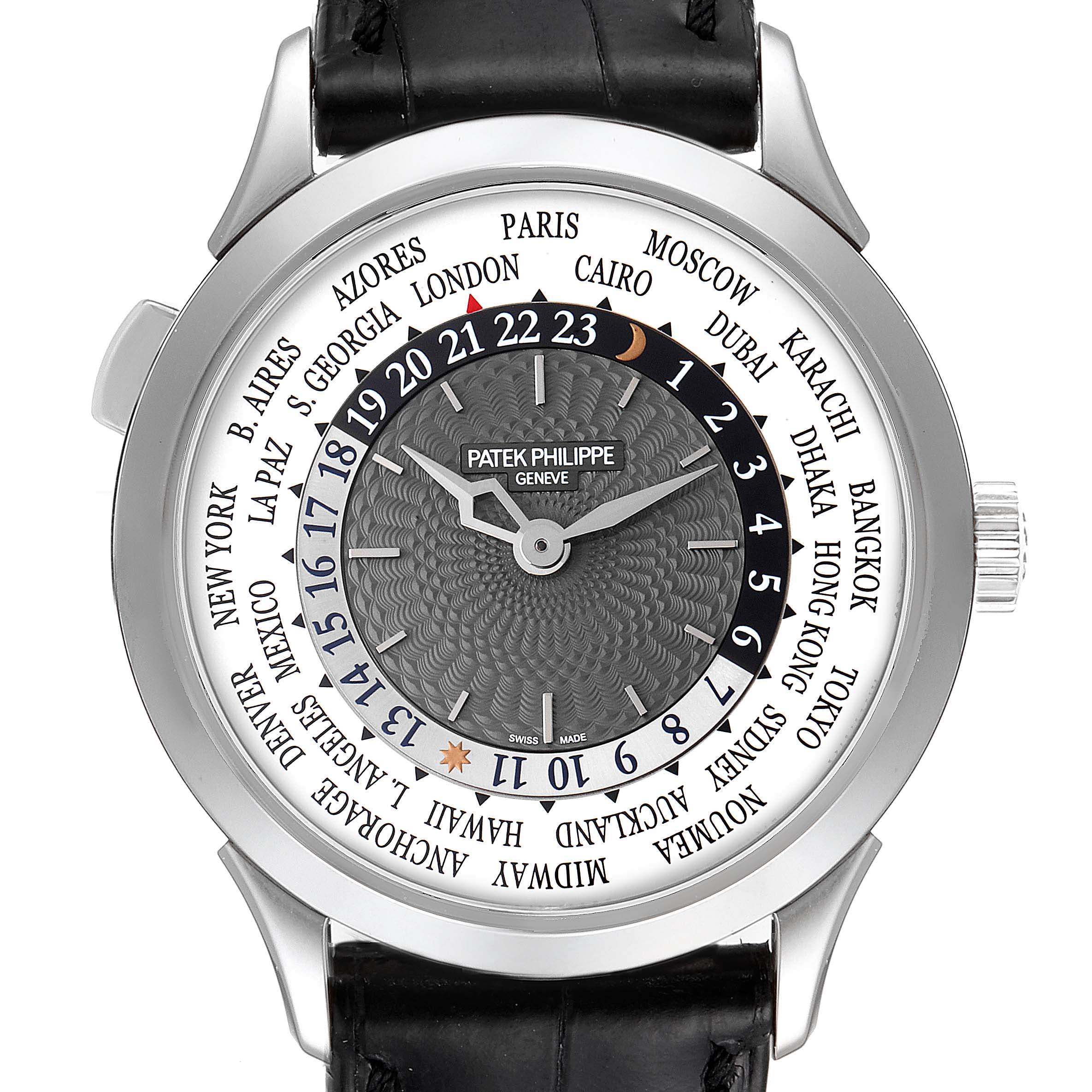 The image shows a front view of the Patek Philippe Complications 5110G Men's White Gold Grey Dial 5110G Men's White Gold Grey Dial watch, displaying the world time feature and a black leather strap.