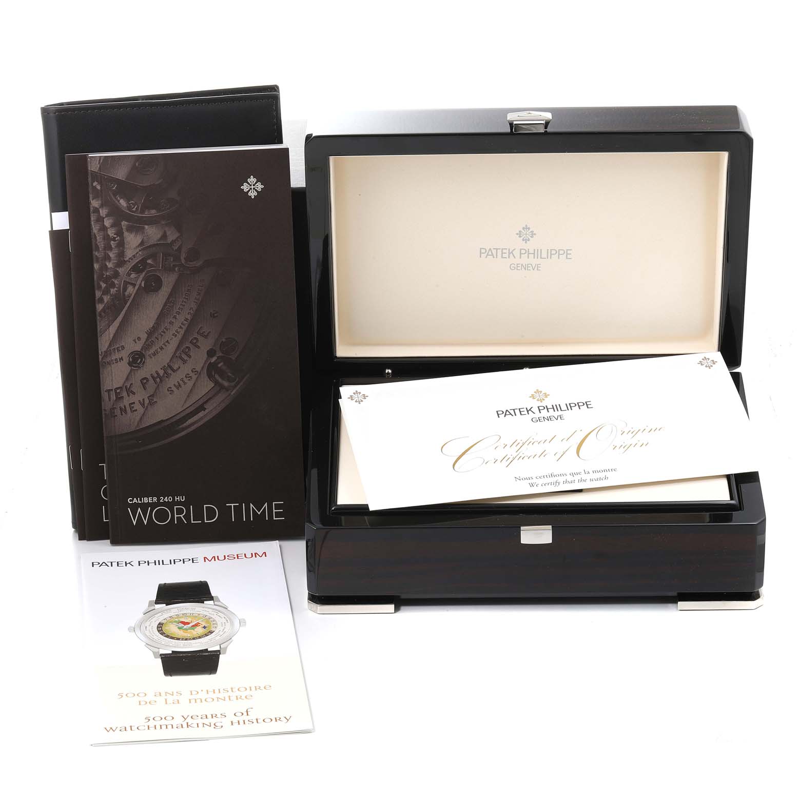 The image shows the packaging, user manuals, and certificate of origin for the Patek Philippe Complications 5110G Men's White Gold Grey Dial 5110G Men's White Gold Grey Dial model.