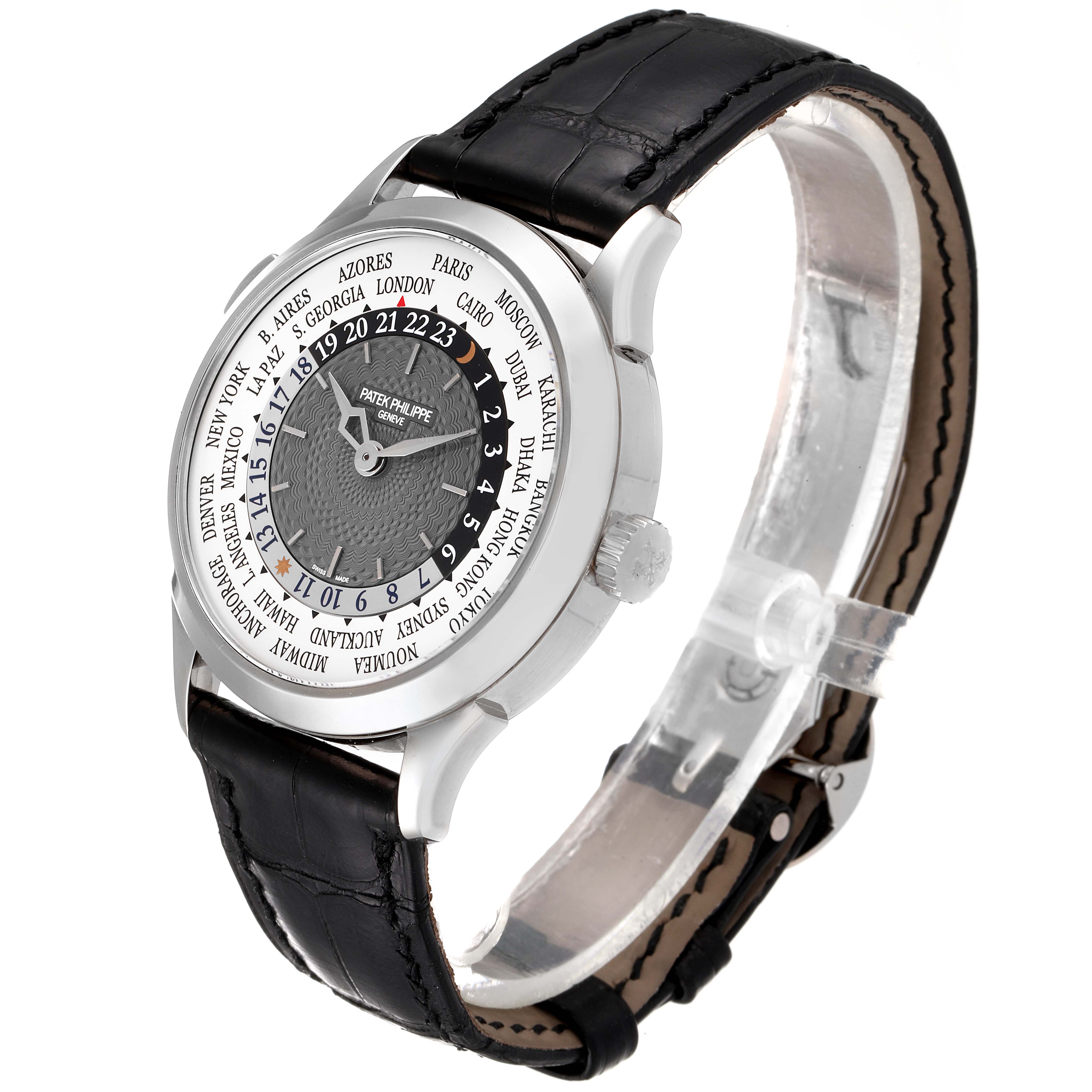 The image shows a side angle view of a Patek Philippe Complications 5110G Men's White Gold Grey Dial 5110G Men's White Gold Grey Dial model watch, highlighting its leather strap and world time dial.