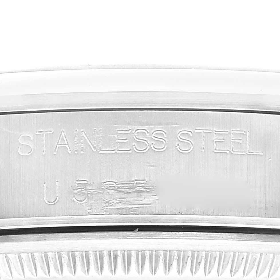 The image shows a close-up of the engraved markings on the stainless steel case of a Rolex Air-King 14000 Men's Stainless Steel Blue Dial 14000 Men's Stainless Steel Blue Dial watch.