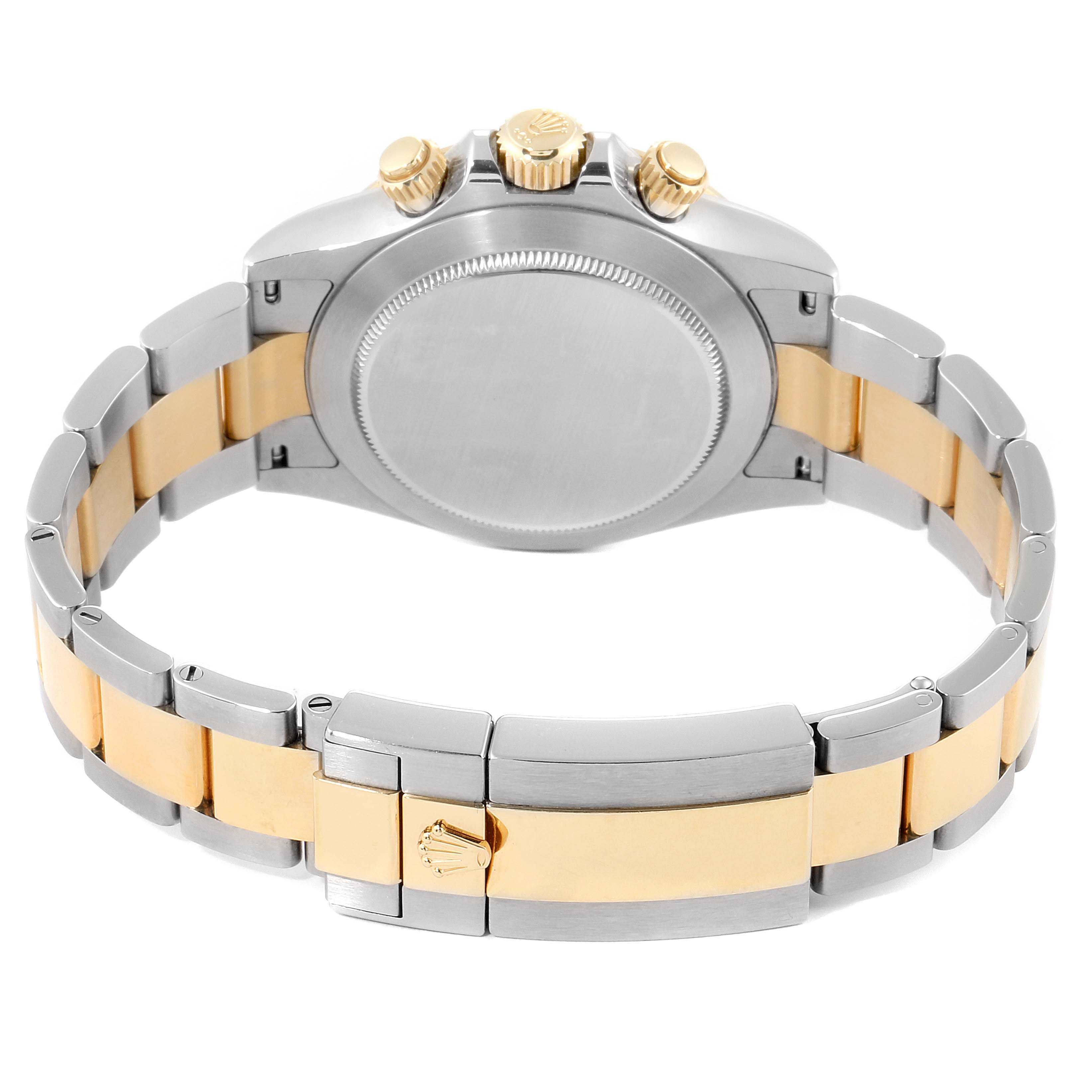 The image shows the back view of a Rolex Daytona 116503 Men's Steel and Gold (two tone) Champagne Dial 116503 Men's Steel and Gold (two tone) Champagne Dial watch, highlighting its case, buttons, and two-tone bracelet.