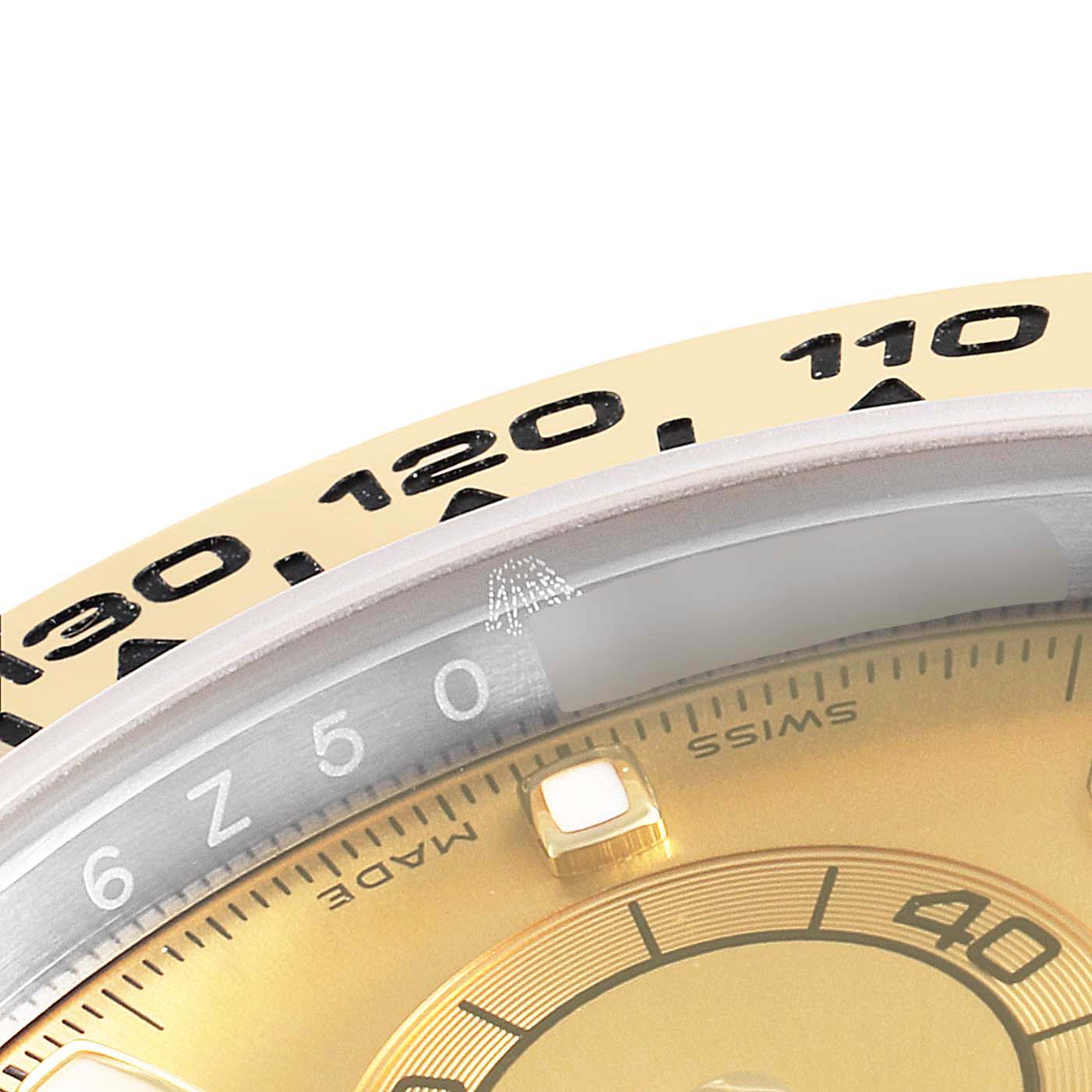 The close-up angle shows the bezel and part of the dial on a Rolex Daytona 116503 Men's Steel and Gold (two tone) Champagne Dial 116503 Men's Steel and Gold (two tone) Champagne Dial watch.