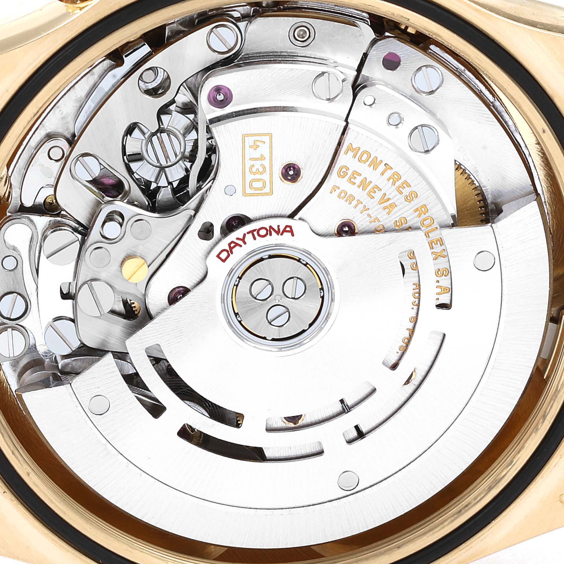 This image shows the intricate movement mechanism of a Rolex Daytona 116528 Men's Yellow Gold Black Dial 116528 Men's Yellow Gold Black Dial watch, viewed from the back.