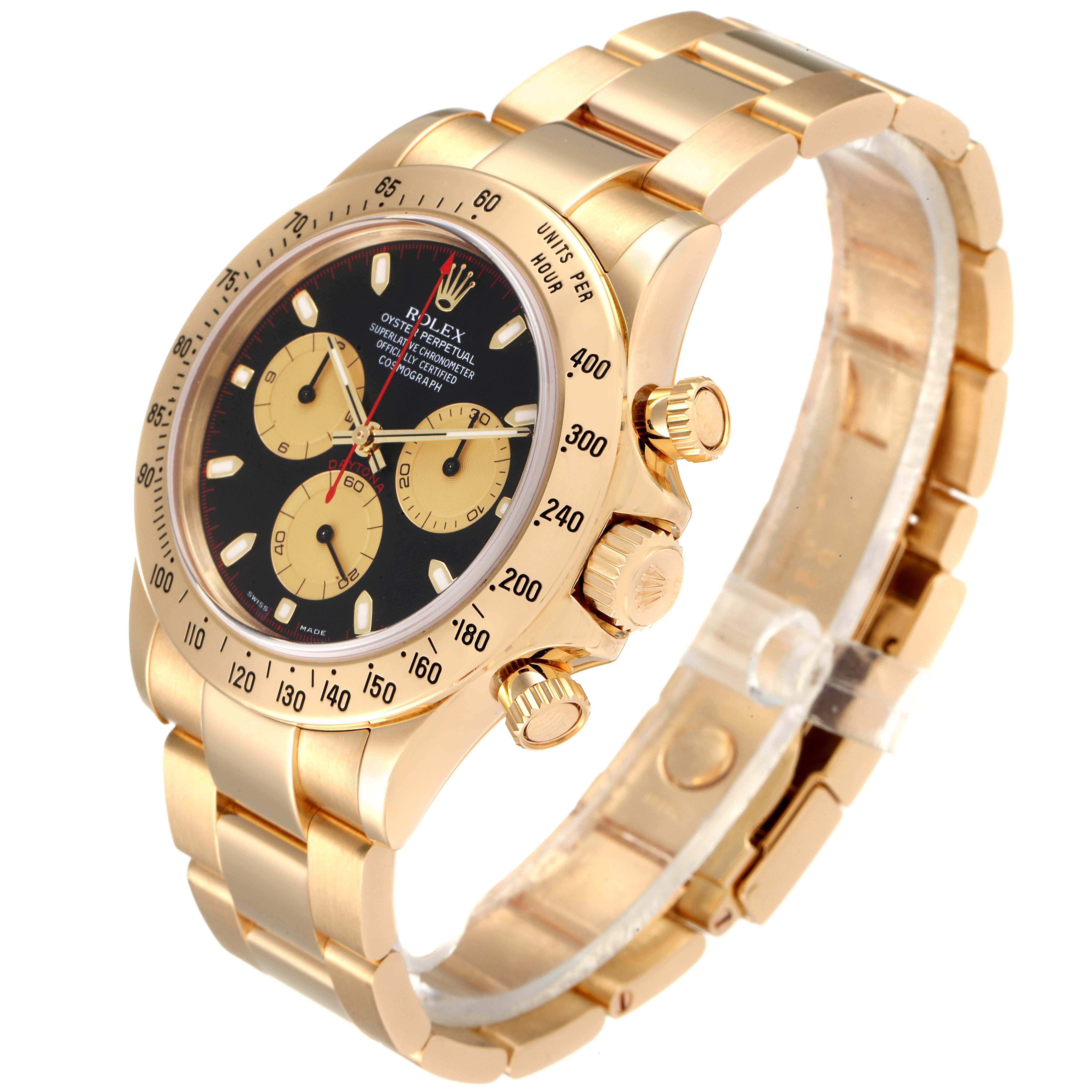 The image shows a Rolex Daytona 116528 Men's Yellow Gold Black Dial 116528 Men's Yellow Gold Black Dial watch at an angle, highlighting its gold bracelet, black dial, and chronograph features.