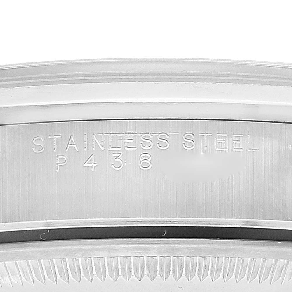 This image shows a close-up of the engraved stainless steel inscription on the inner bezel of a Rolex Date 15200 Men
s Stainless Steel White Dial 15200 Men
s Stainless Steel White Dial watch.