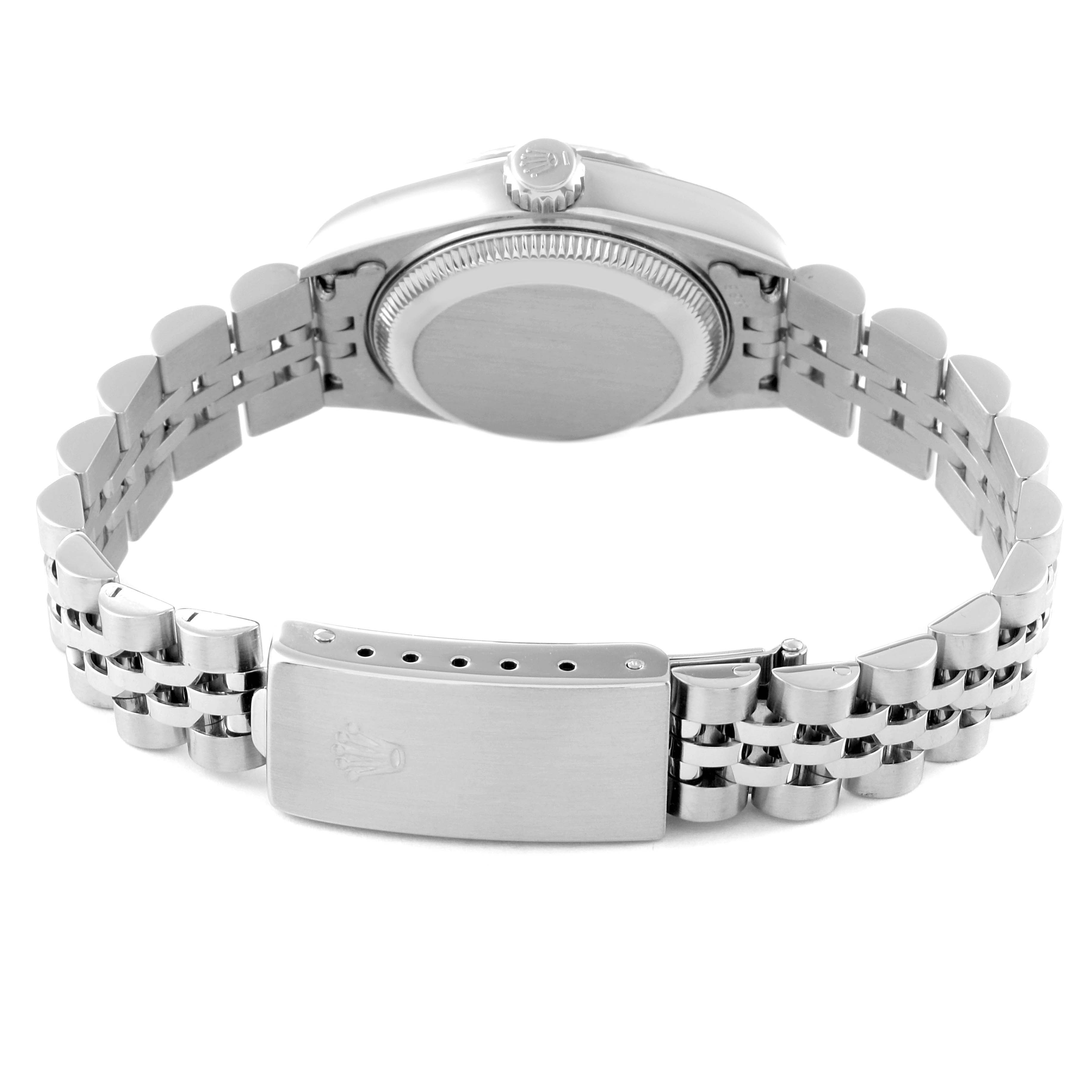 The image shows the back view of a Rolex Datejust 69174 Women's Stainless Steel Pink Dial 69174 Women's Stainless Steel Pink Dial watch, highlighting its case back, crown, and bracelet with clasp.