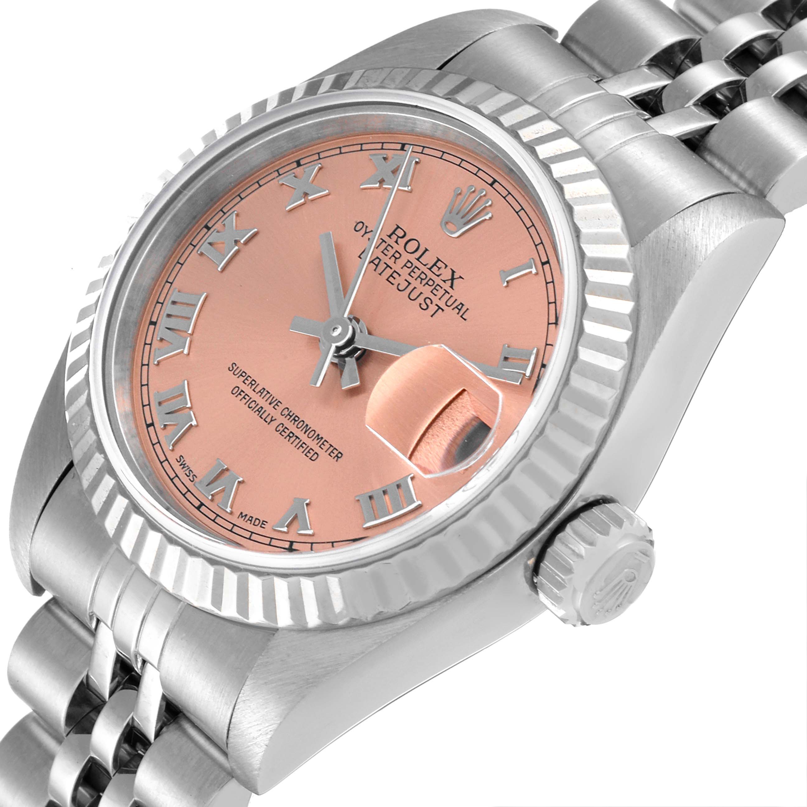 The image shows a close-up angled view of the Rolex Datejust 69174 Women's Stainless Steel Pink Dial 69174 Women's Stainless Steel Pink Dial watch's face, bezel, and part of its jubilee bracelet.