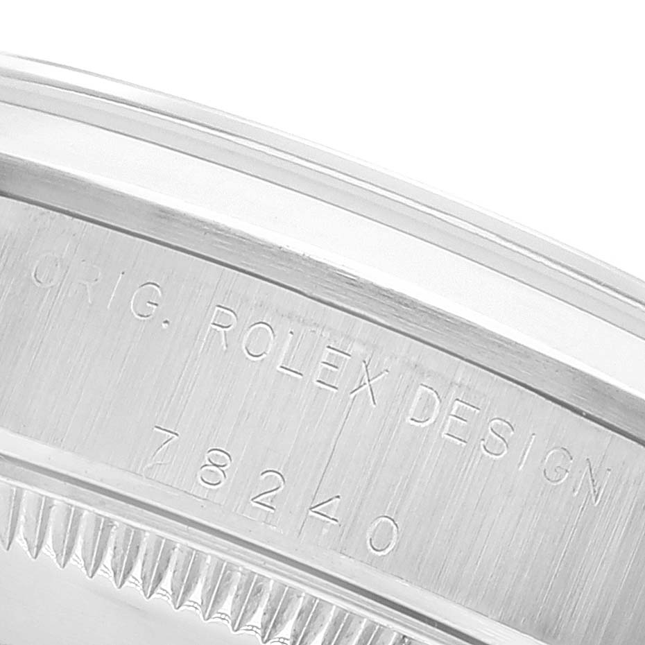 This is a close-up angle of the case side engraving on a Rolex Mid-Size 78240 Women
s Stainless Steel Black Dial 78240 Women
s Stainless Steel Black Dial model, showing the text "ORIG. ROLEX DESIGN" and the model number "78240".