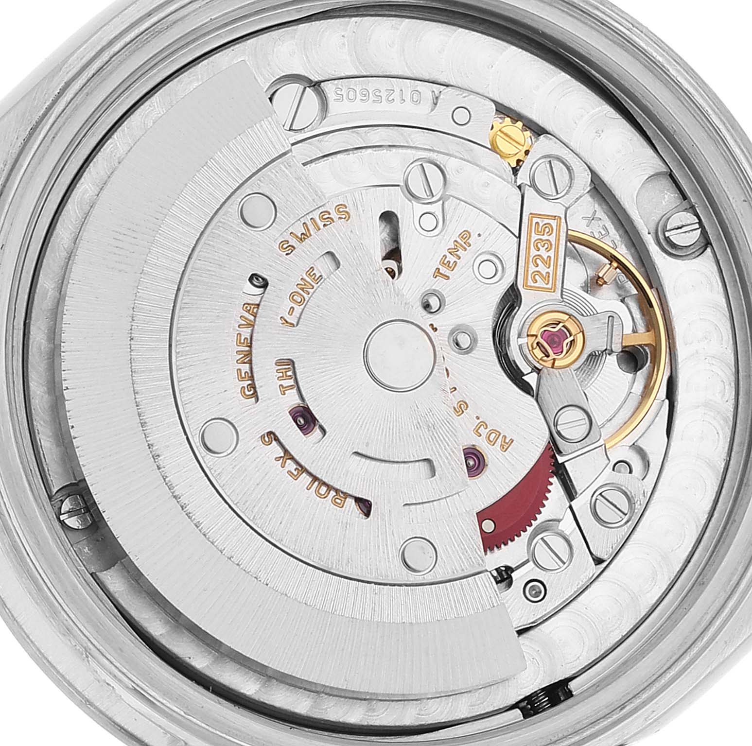 The image shows the intricate internal mechanism of a Rolex Mid-Size 78240 Women
s Stainless Steel Black Dial 78240 Women
s Stainless Steel Black Dial model watch, specifically its movement and rotor.