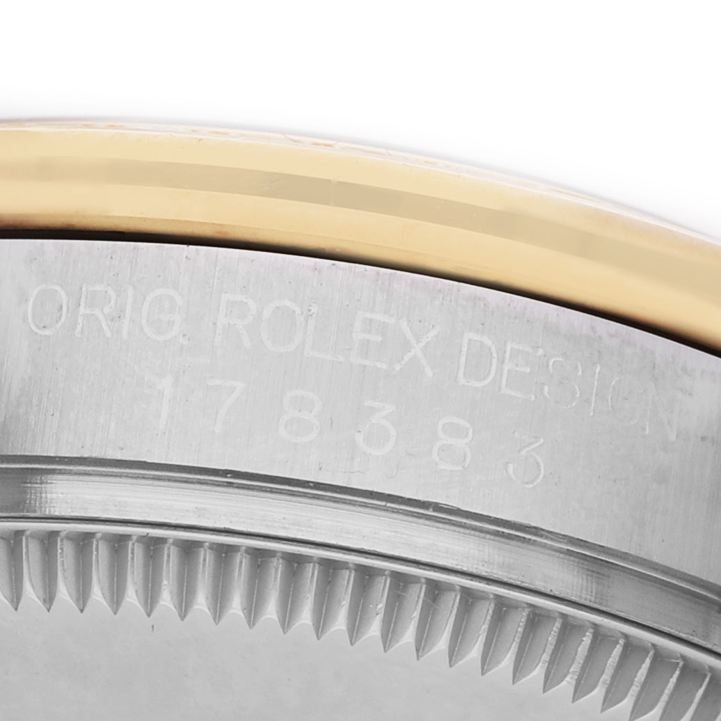 The image shows a close-up view of the side of a Rolex Datejust 178383 Women's Steel and Gold (two tone) Silver Dial, highlighting the watch's case and bezel details.