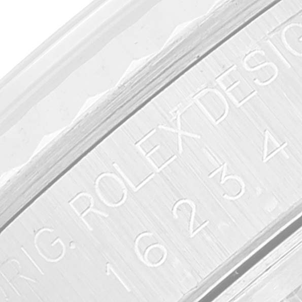 This image shows a close-up of the engraved text on the case of a Rolex Datejust 16234 Men's Stainless Steel Silver Dial 16234 Men's Stainless Steel Silver Dial watch.