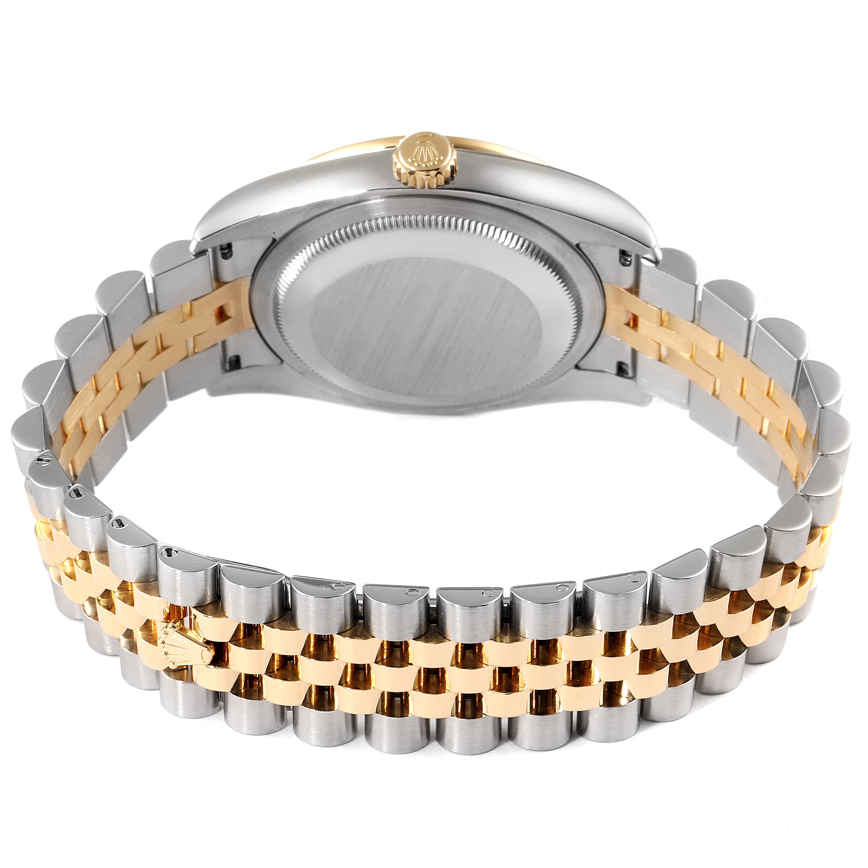 This image shows the back of a Rolex Datejust 116243 Men's Steel and Gold (two tone) Champagne Dial 116243 Men's Steel and Gold (two tone) Champagne Dial watch, focusing on the case back and two-tone bracelet.