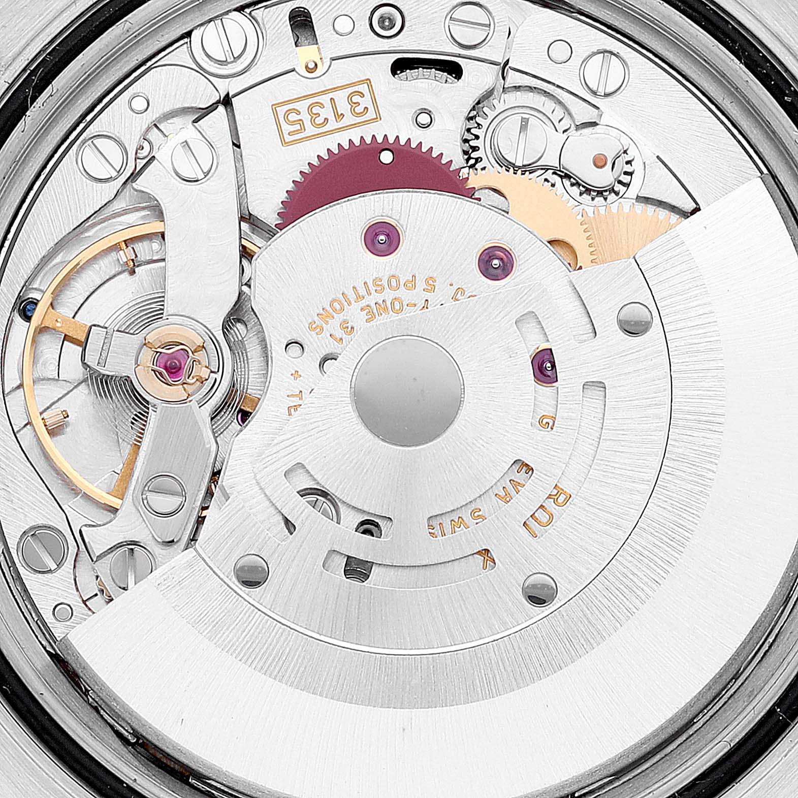The image shows a close-up of the movement mechanism of a Rolex Datejust 116233 Men's Steel and Gold (two tone) Champagne Dial 116233 Men's Steel and Gold (two tone) Champagne Dial watch, highlighting gears and the rotor.