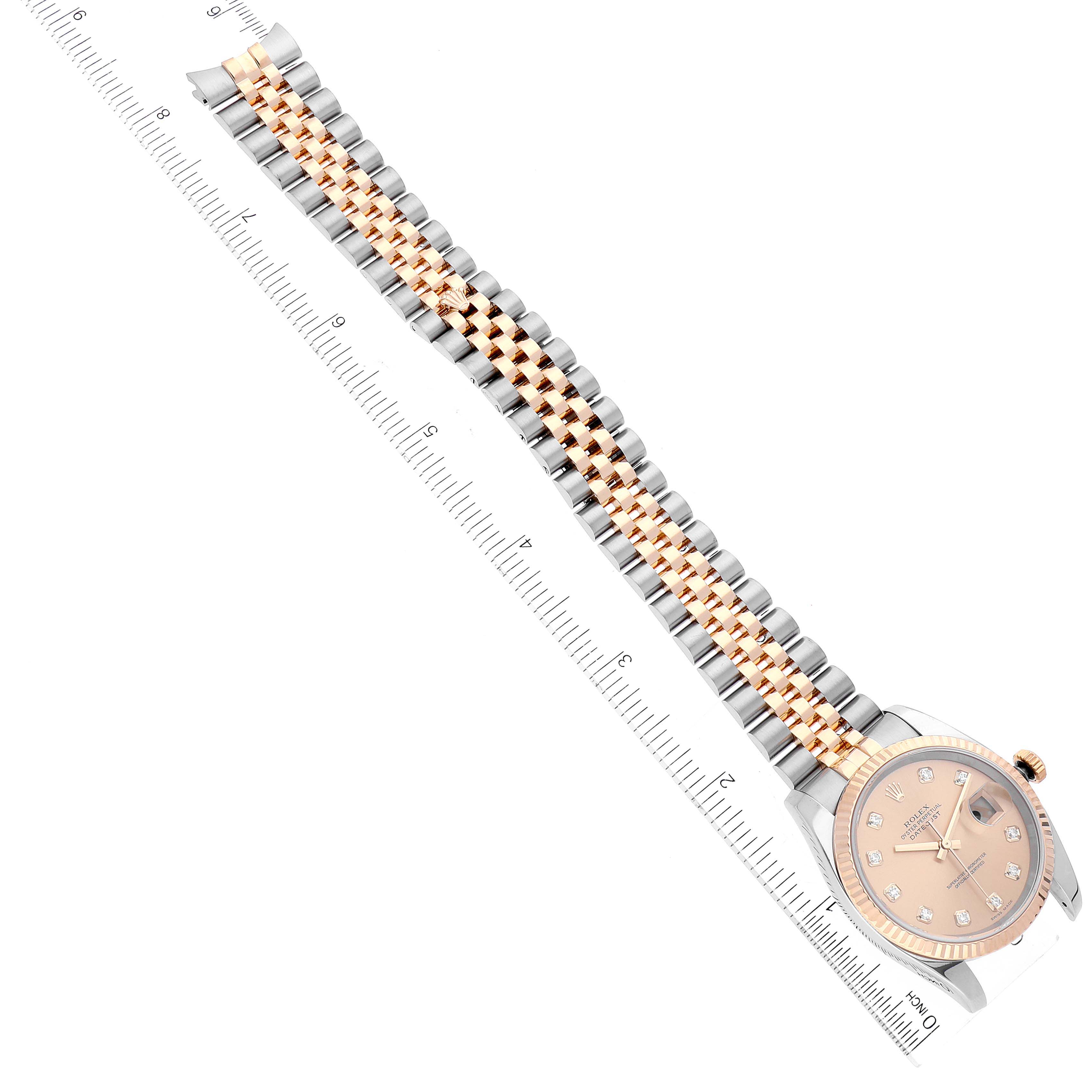 The image shows a Rolex Datejust 116233 Men's Steel and Gold (two tone) Champagne Dial 116233 Men's Steel and Gold (two tone) Champagne Dial watch laid flat with a ruler measuring the length of the band.