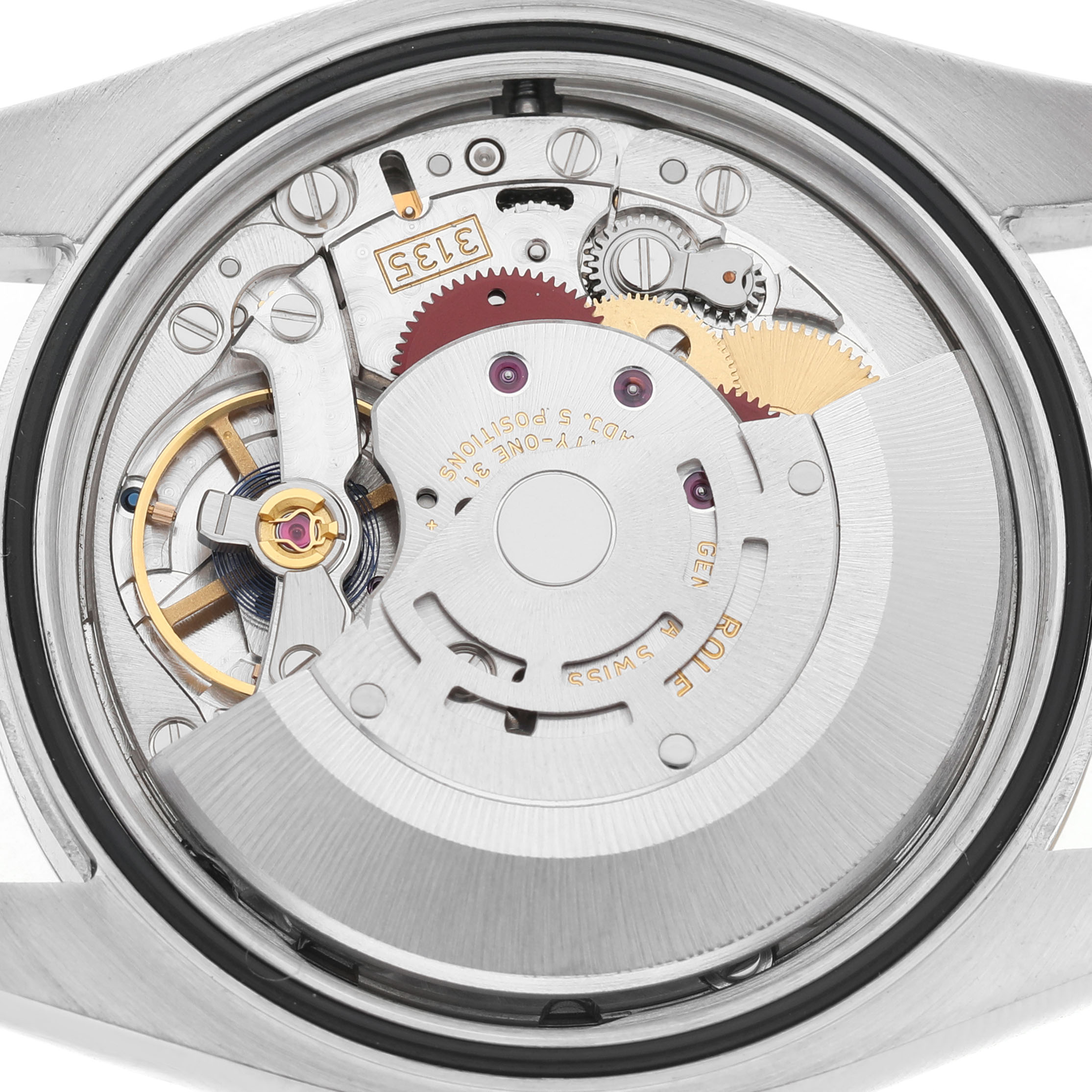 The image shows the movement of a Rolex Datejust 116233 Men's Steel and Gold (two tone) White Dial watch from a rear angle, highlighting the intricate gears and rotor.