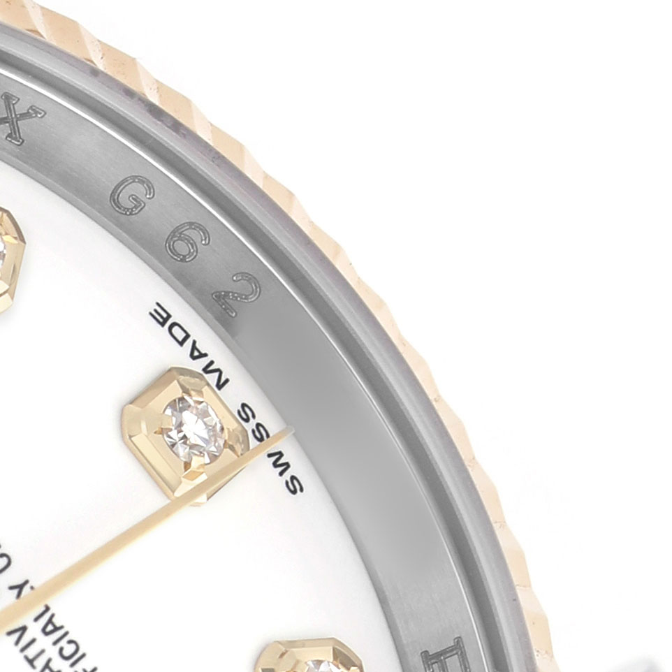 The image shows a close-up of a Rolex Datejust 116233 Men's Steel and Gold (two tone) White Dial watch, highlighting a diamond marker and part of the bezel.