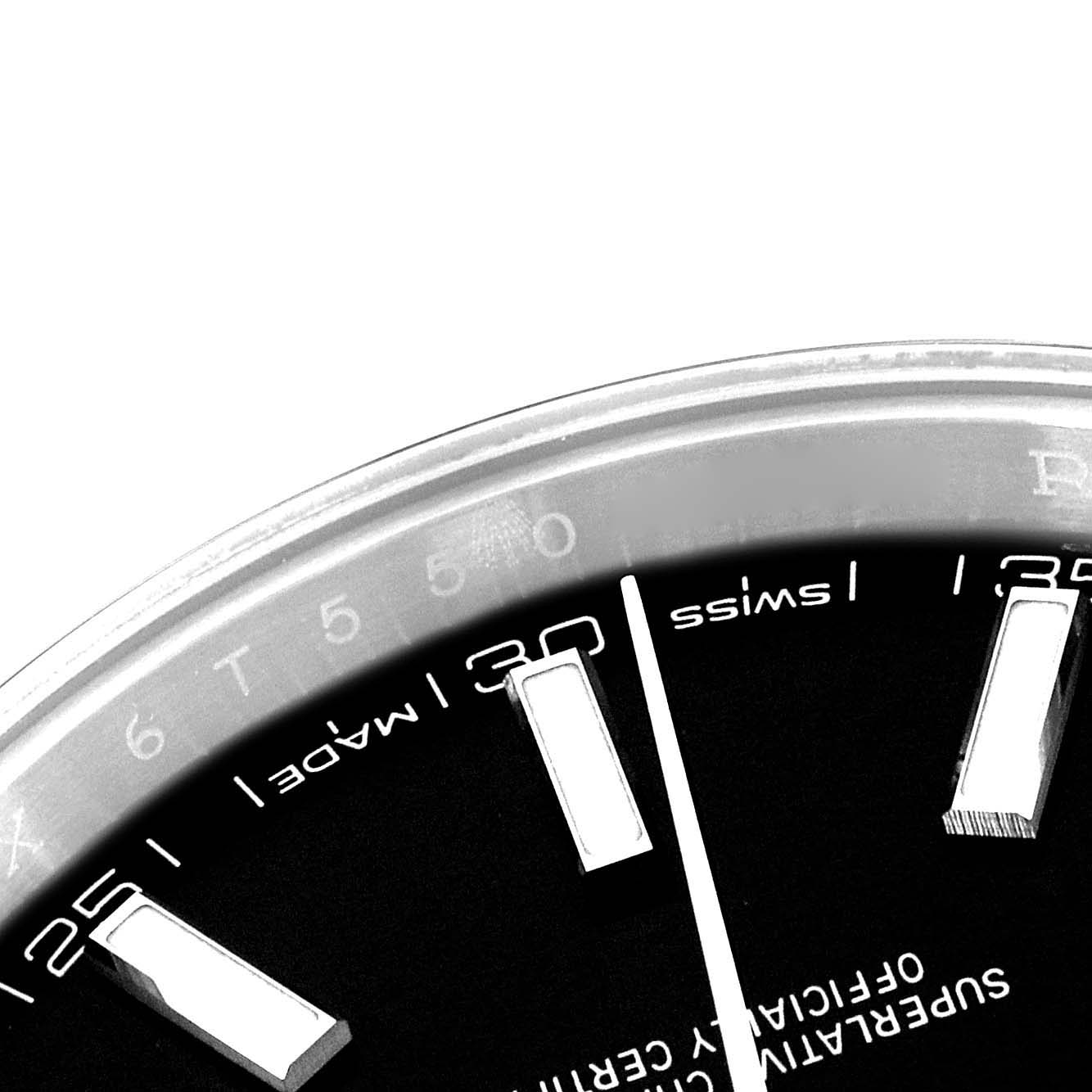 The image shows a close-up of the dial and indices, including parts of the markers and minute scale of the Rolex Datejust 41 126300 Men
s Stainless Steel Black Dial 126300 Men
s Stainless Steel Black Dial model.