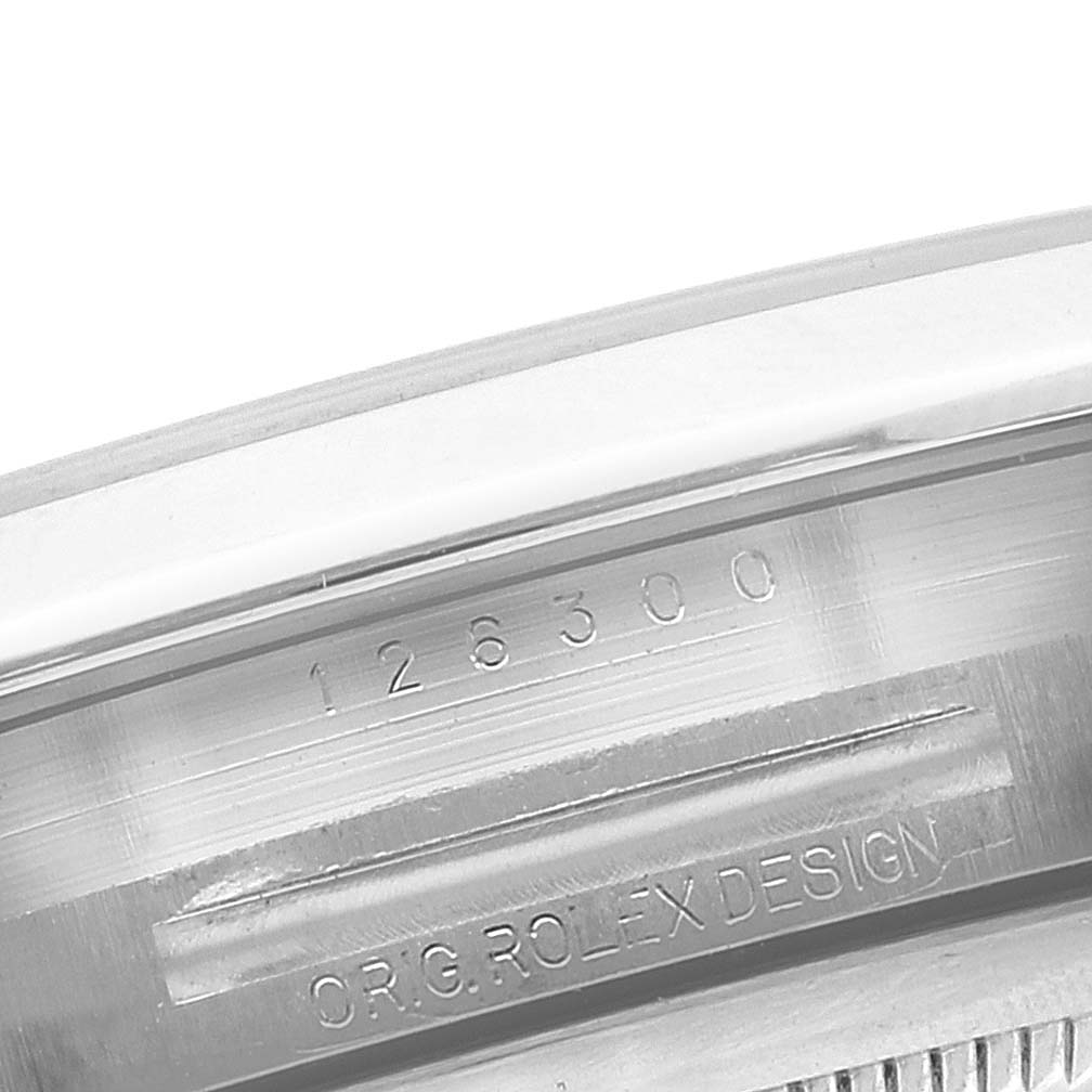 This image shows a close-up of the inner bezel and serial number of the Rolex Datejust 41 126300 Men
s Stainless Steel Grey Dial 126300 Men
s Stainless Steel Grey Dial watch.