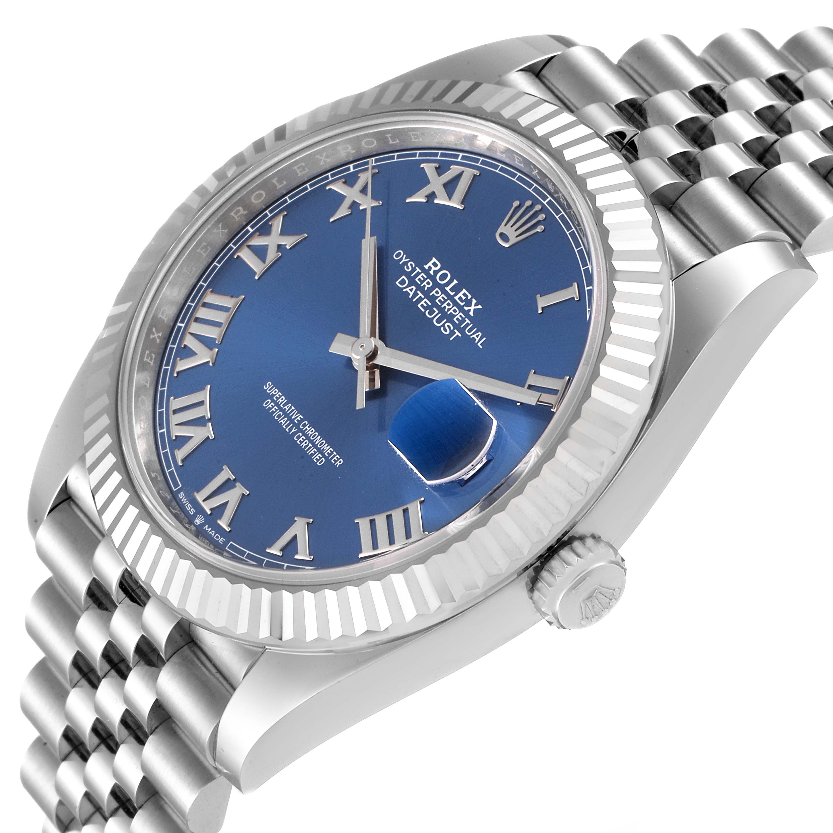 The image shows a Rolex Datejust 41 126334 Men
s Stainless Steel Blue Dial 126334 Men
s Stainless Steel Blue Dial watch at a slight angle, highlighting the blue dial, Roman numerals, fluted bezel, and Jubilee bracelet.