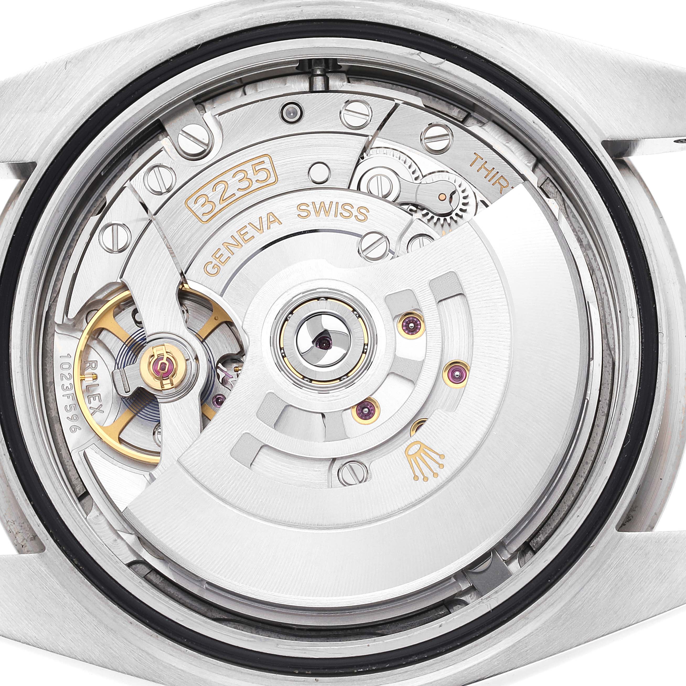 The image shows the movement mechanism of a Rolex Datejust 41 126334 Men's Stainless Steel Blue Dial 126334 Men's Stainless Steel Blue Dial watch from the back, highlighting its intricate components.