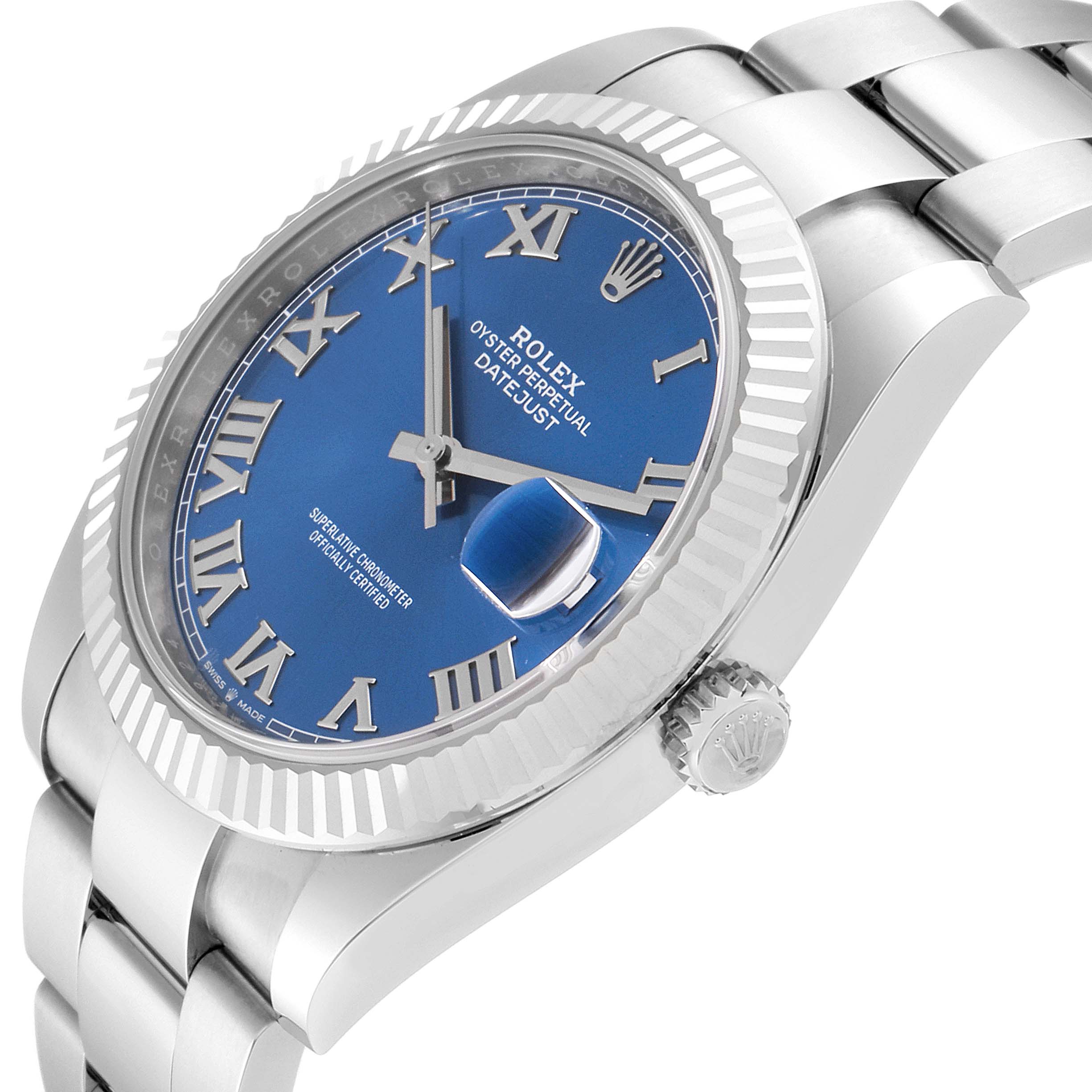 The image shows a side angle of the Rolex Datejust 41 126334 Men
s Stainless Steel Blue Dial 126334 Men
s Stainless Steel Blue Dial, focusing on its blue dial, fluted bezel, and part of the bracelet.