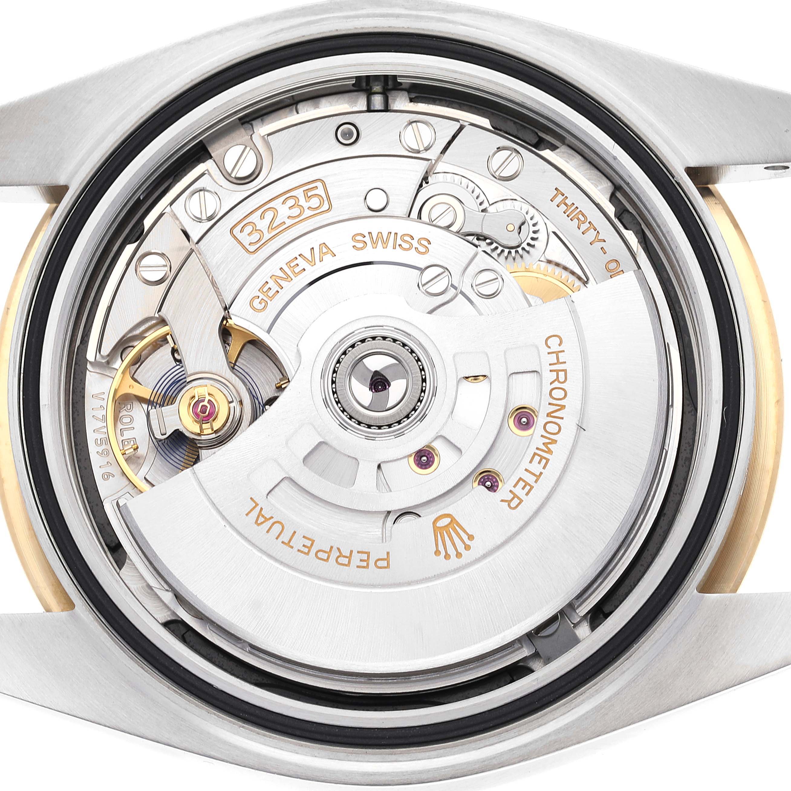 This image shows the internal movement mechanism of a Rolex Datejust 41 126303 Men's Steel and Gold (two tone) Black Dial 126303 Men's Steel and Gold (two tone) Black Dial watch from a top-down angle.