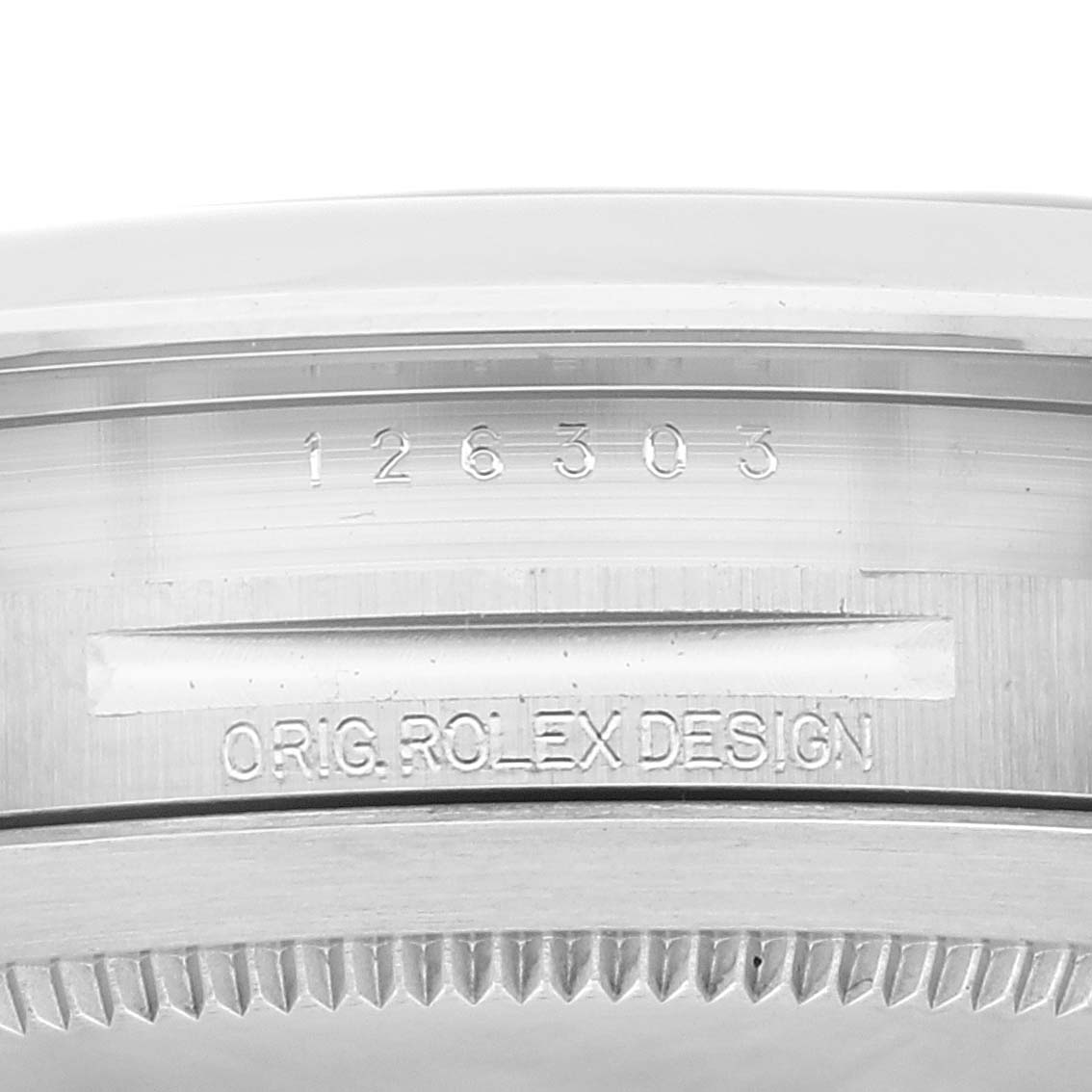 The image shows the inner bezel and case serial number of a Rolex Datejust 41 126303 Men's Steel and Gold (two tone) Black Dial 126303 Men's Steel and Gold (two tone) Black Dial watch.