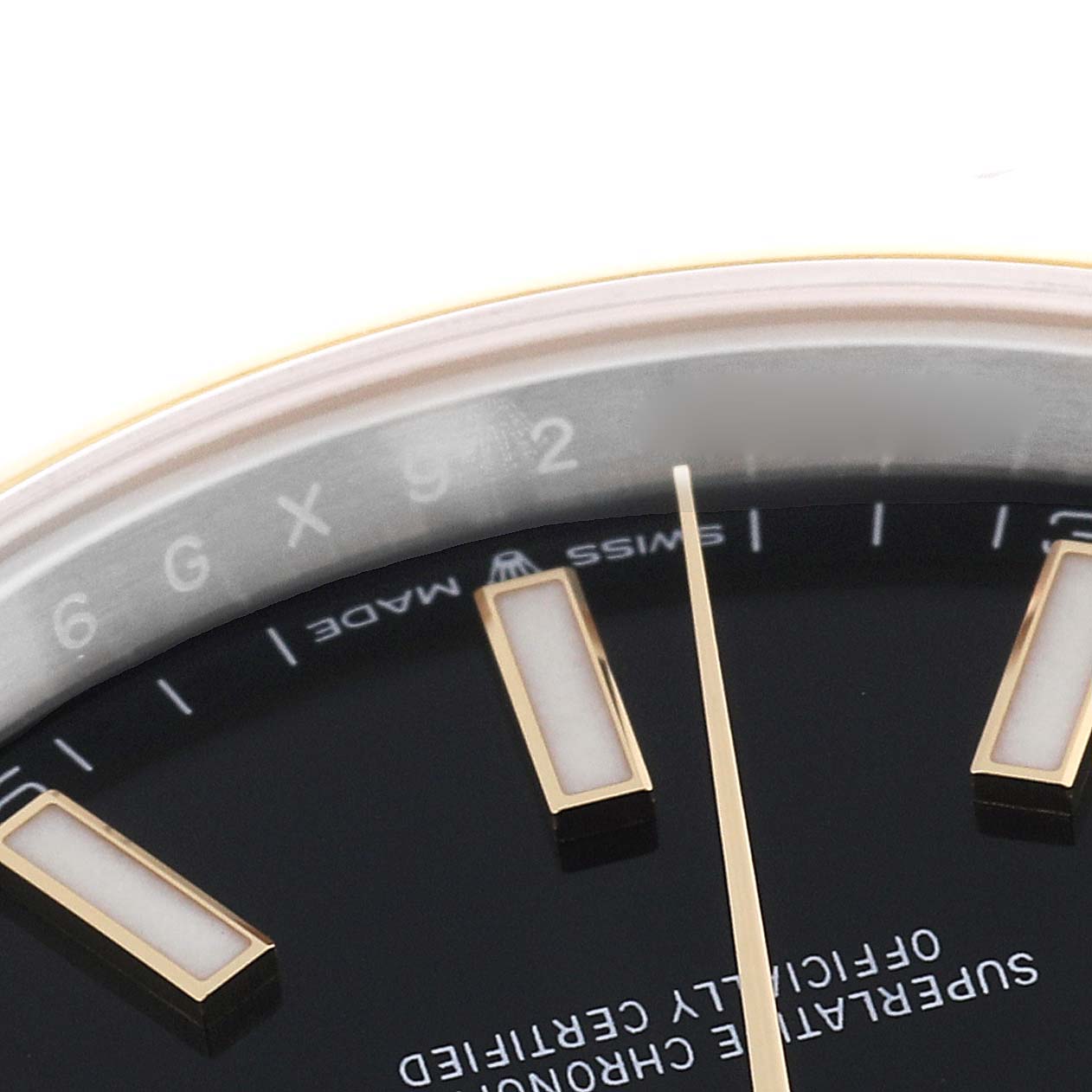 This image shows a close-up view of the dial and hour markers of a Rolex Datejust 41 126303 Men's Steel and Gold (two tone) Black Dial 126303 Men's Steel and Gold (two tone) Black Dial watch, focusing on the upper section.