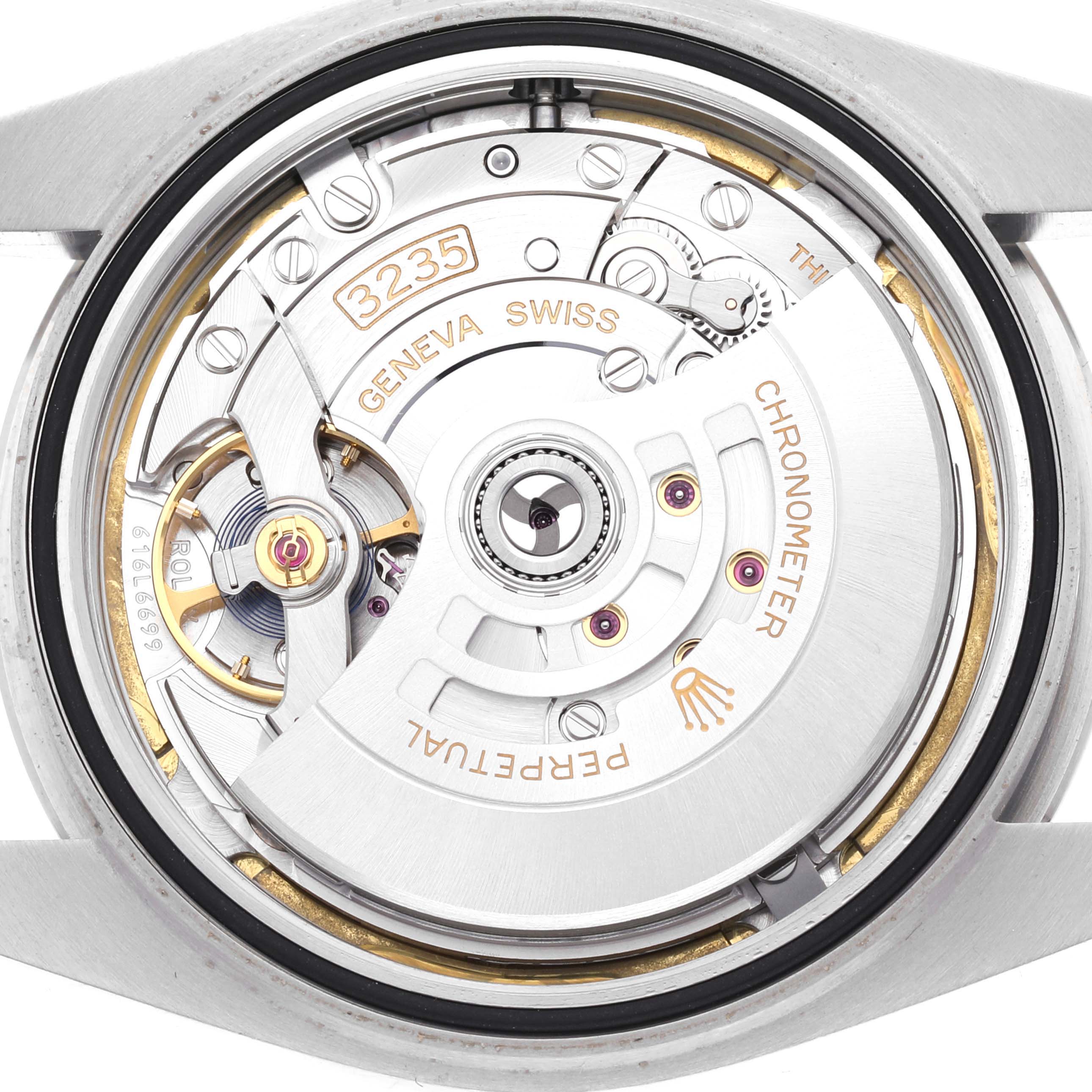 The image shows the case back of the Rolex Datejust 41 126300 Men
s Stainless Steel White Dial 126300 Men
s Stainless Steel White Dial, revealing its intricate internal movement components.