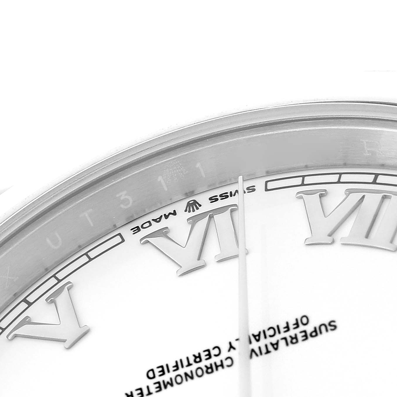 The image shows a close-up top view of the dial of a Rolex Datejust 41 126300 Men
s Stainless Steel White Dial 126300 Men
s Stainless Steel White Dial, highlighting the "Swiss Made" mark and part of the Roman numeral VI.